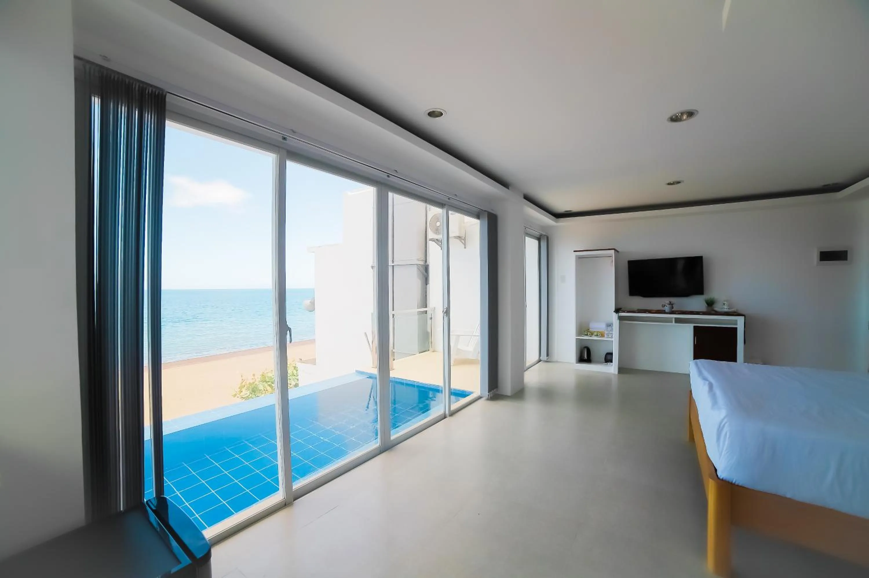 Bedroom in Blue Coast Beach Hotel