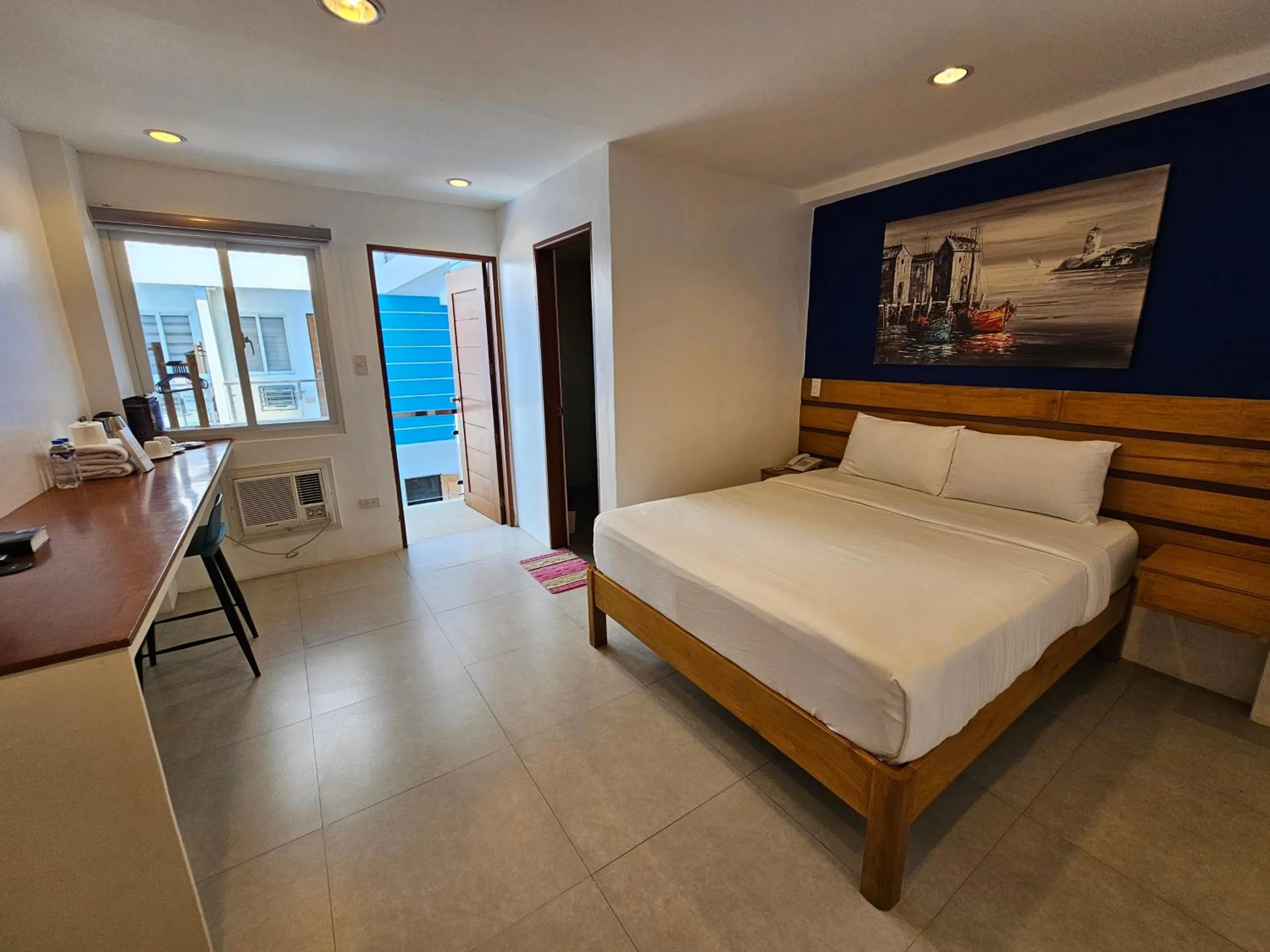 Bedroom in Blue Coast Beach Hotel