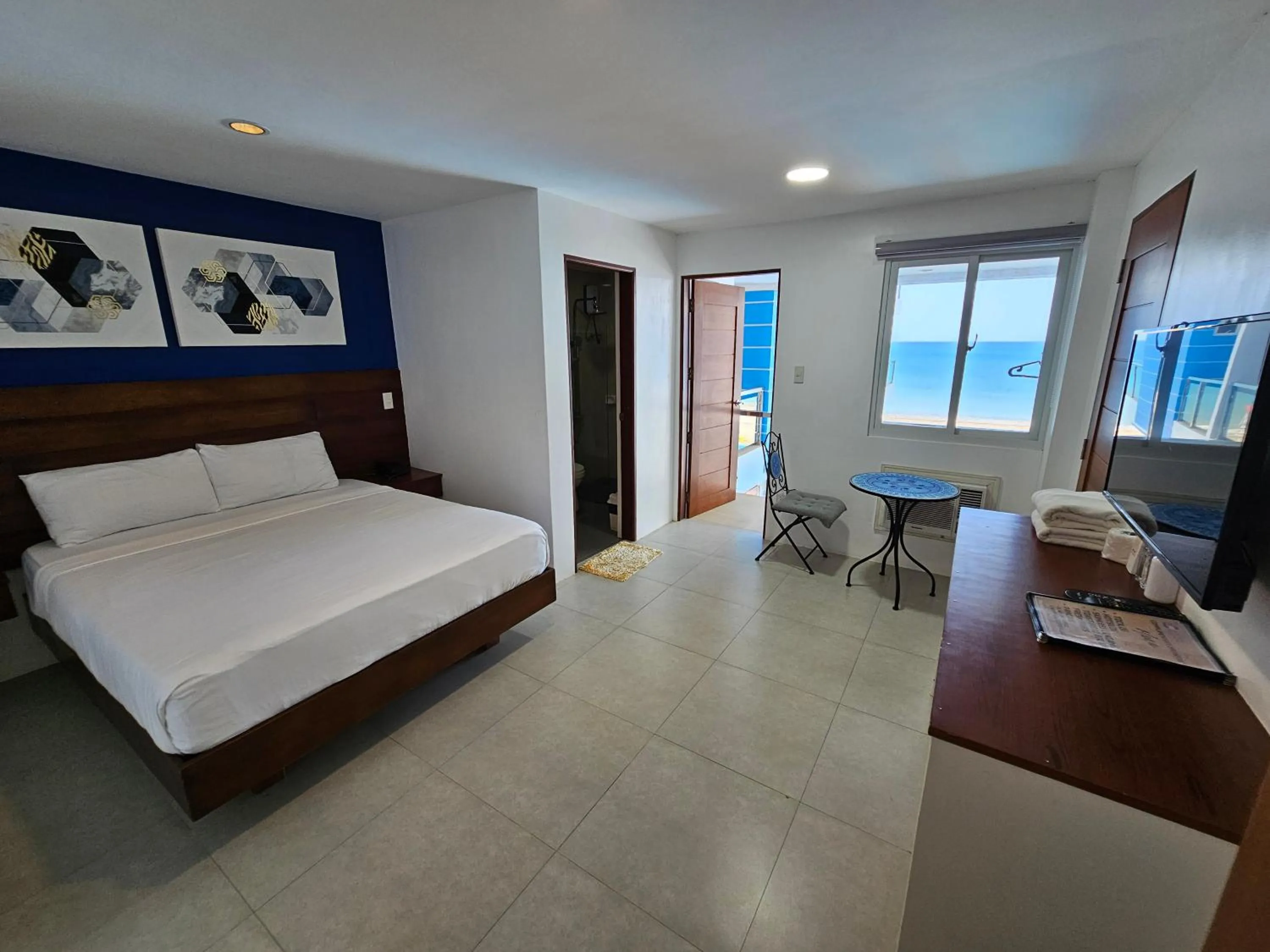 Bedroom in Blue Coast Beach Hotel