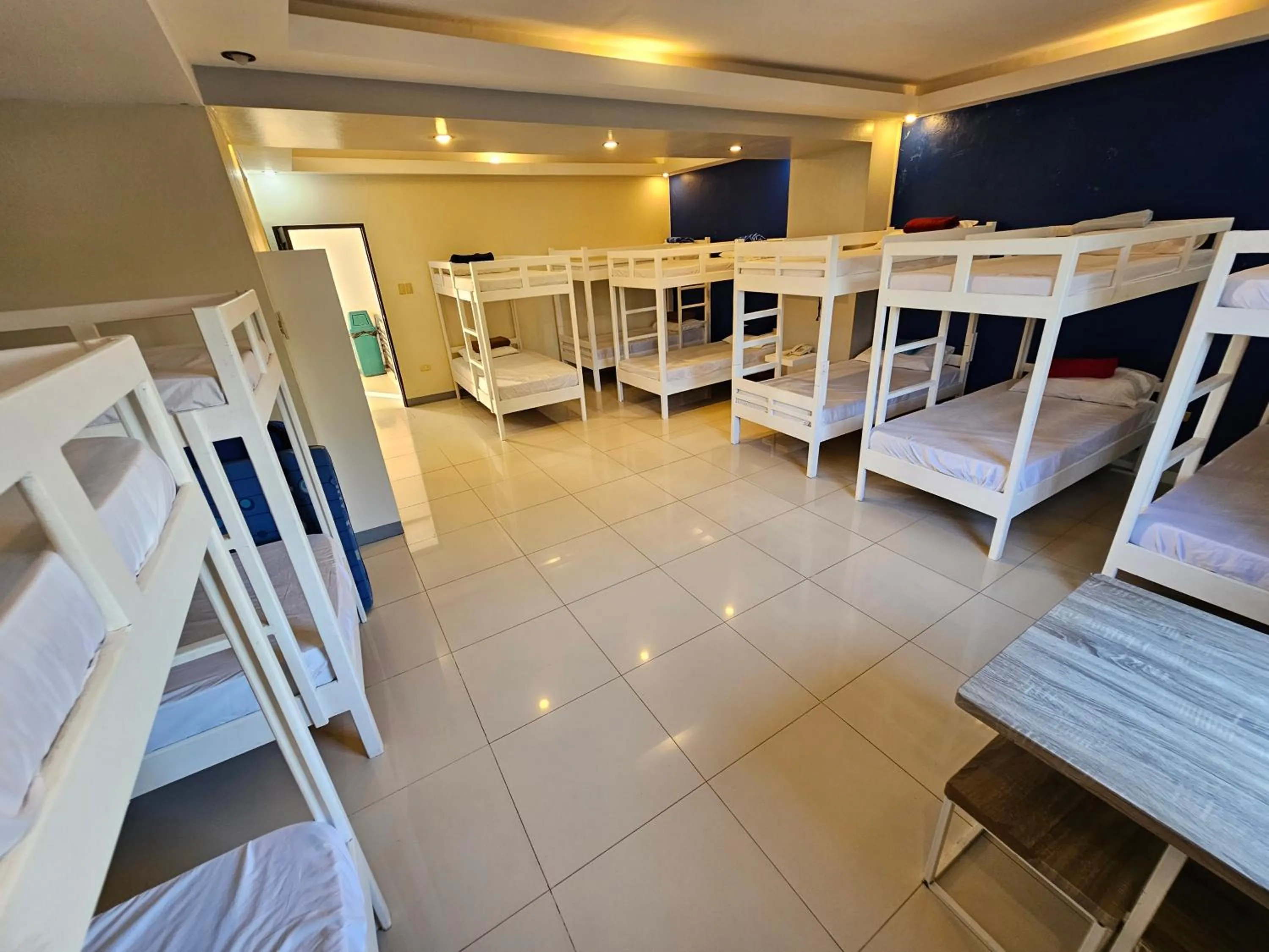 Bed in Blue Coast Beach Hotel