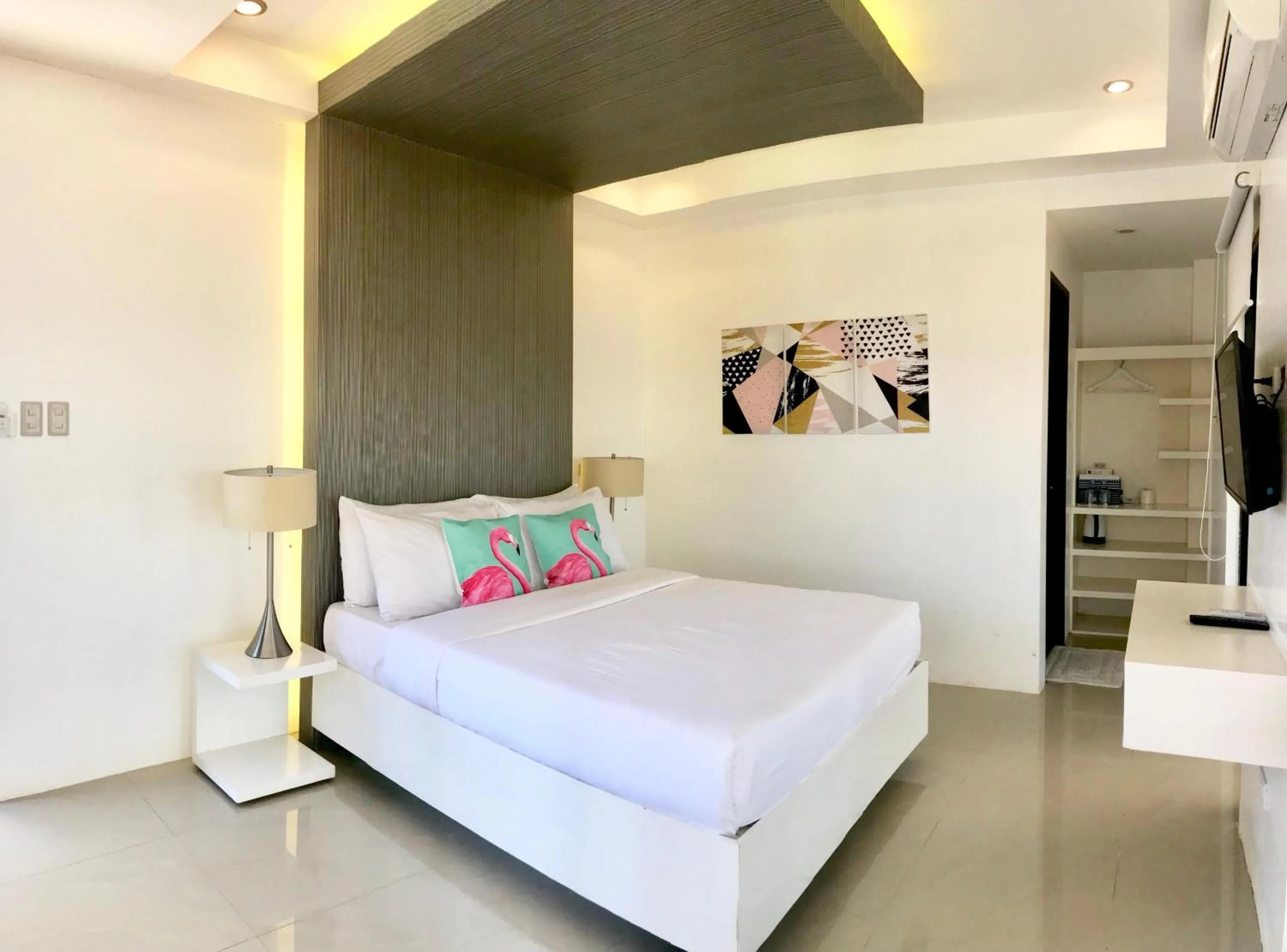 Bed in Blue Coast Beach Hotel