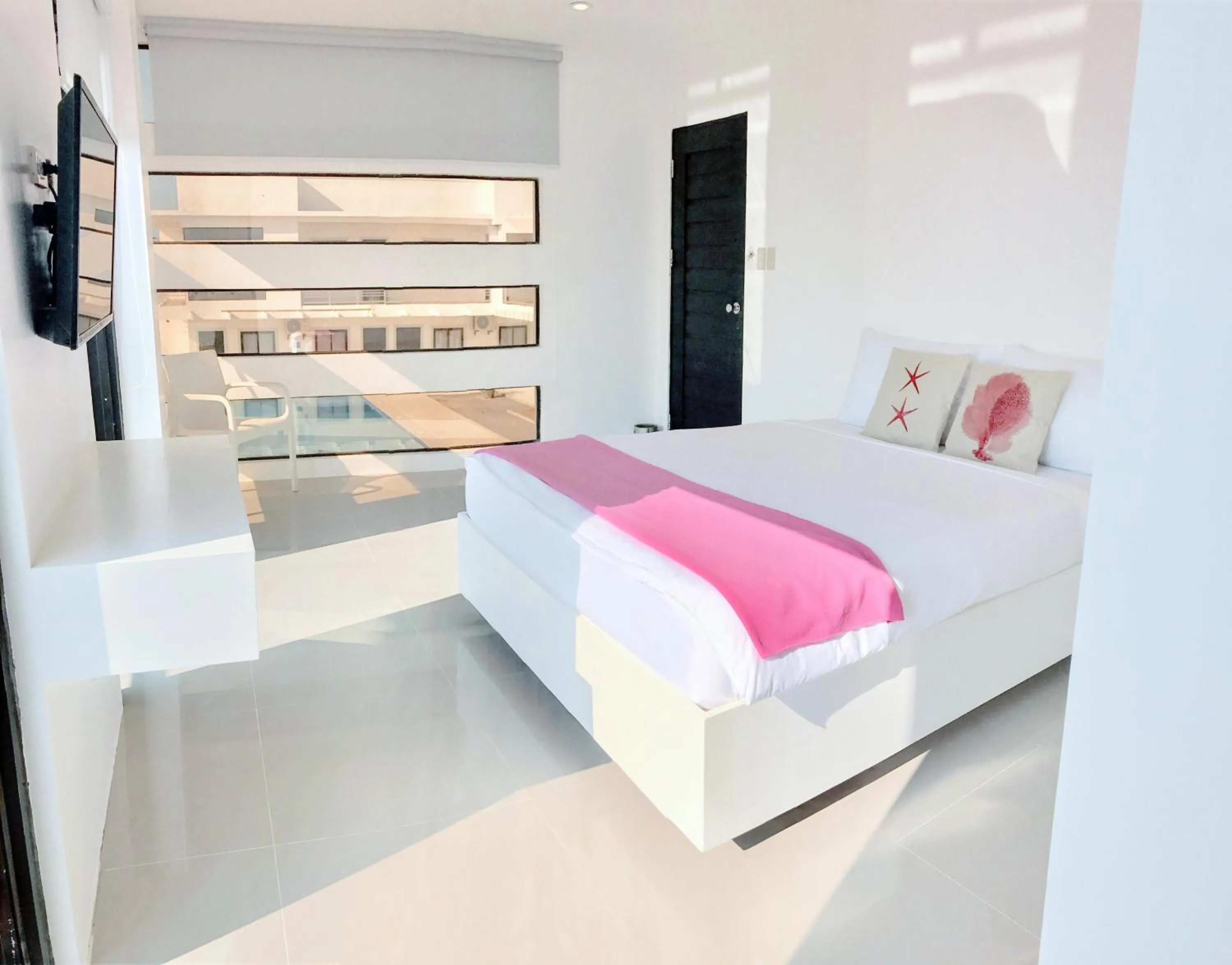 Bedroom in Blue Coast Beach Hotel