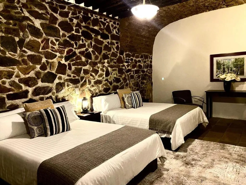 Photo of the whole room, Bed in HOTEL MINA REAL