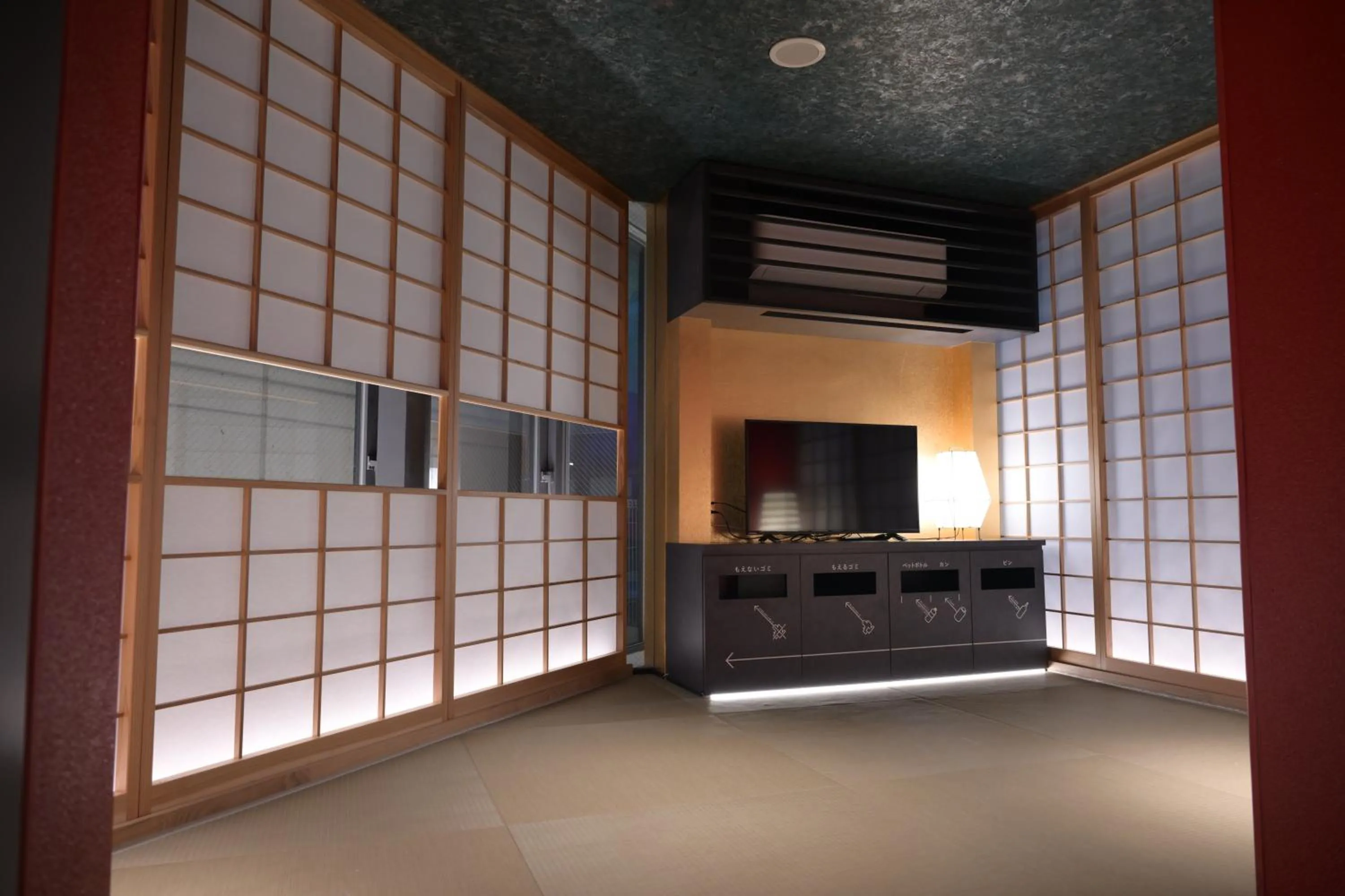 Communal lounge/ TV room in ELE Cabin Shinjuku Kabukicho