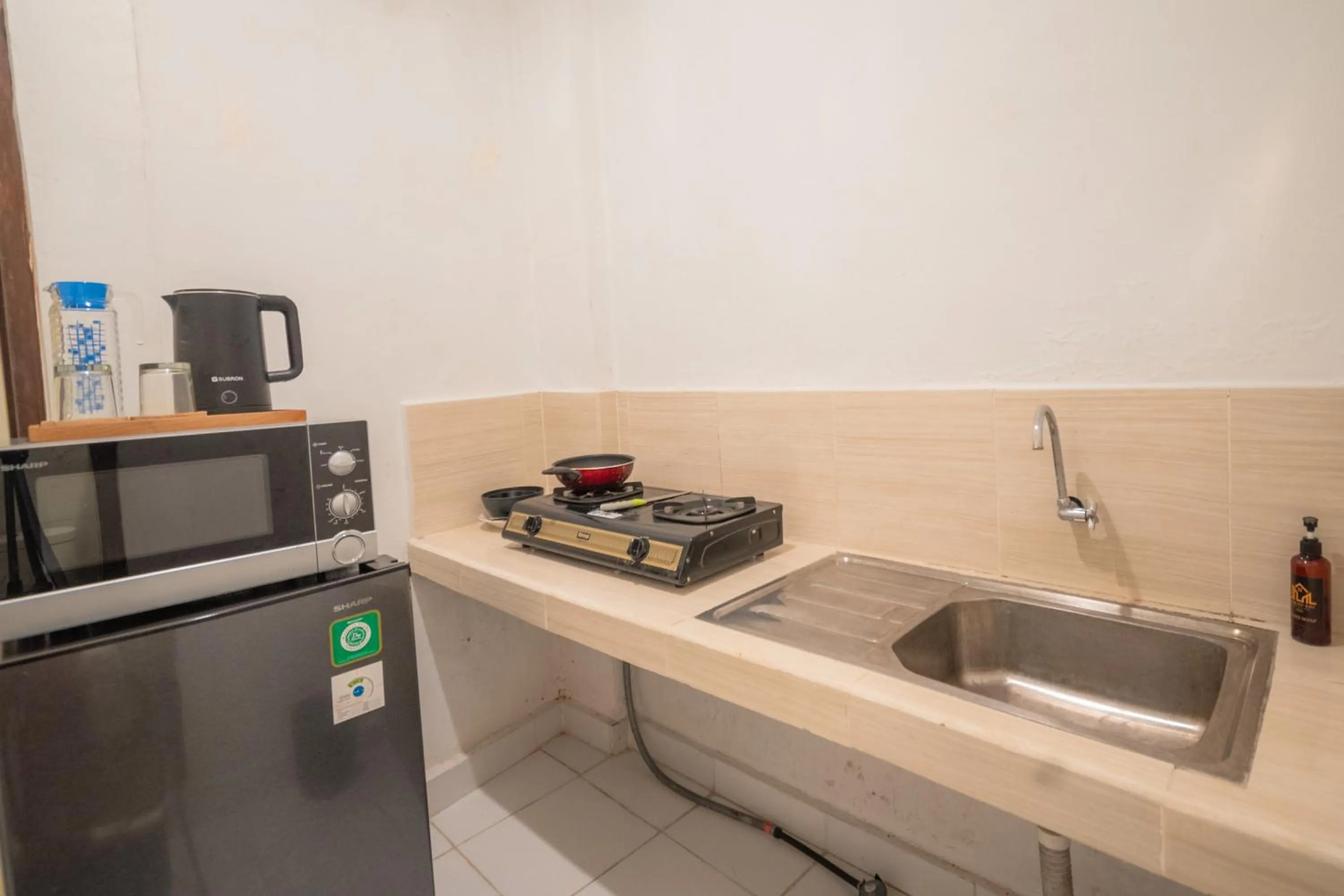 Kitchen or kitchenette in Nobody Inn Bali by Aligna Hospitality