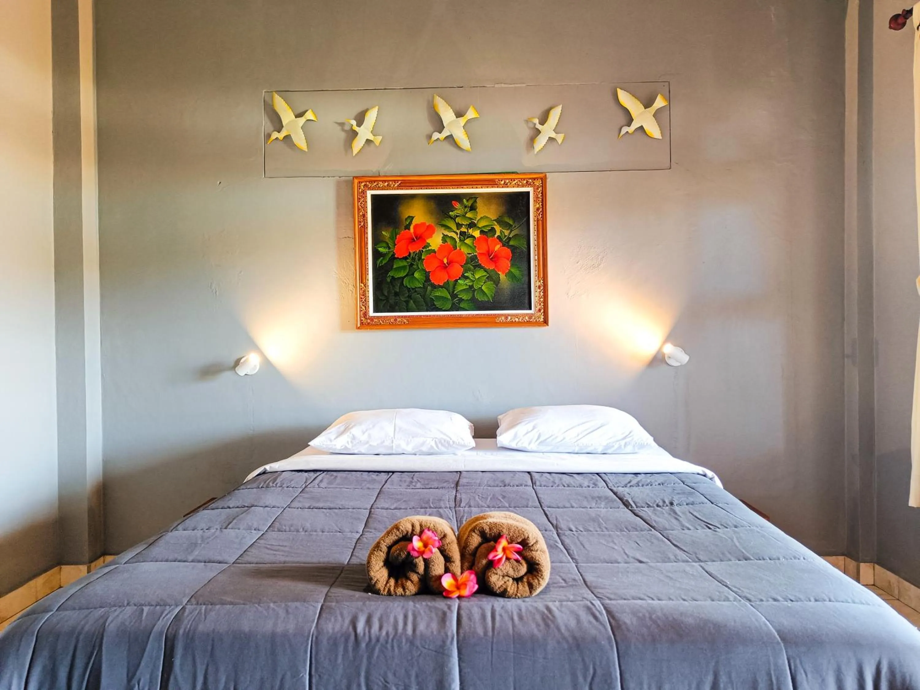 Bed in Nobody Inn Bali at Arya guest house