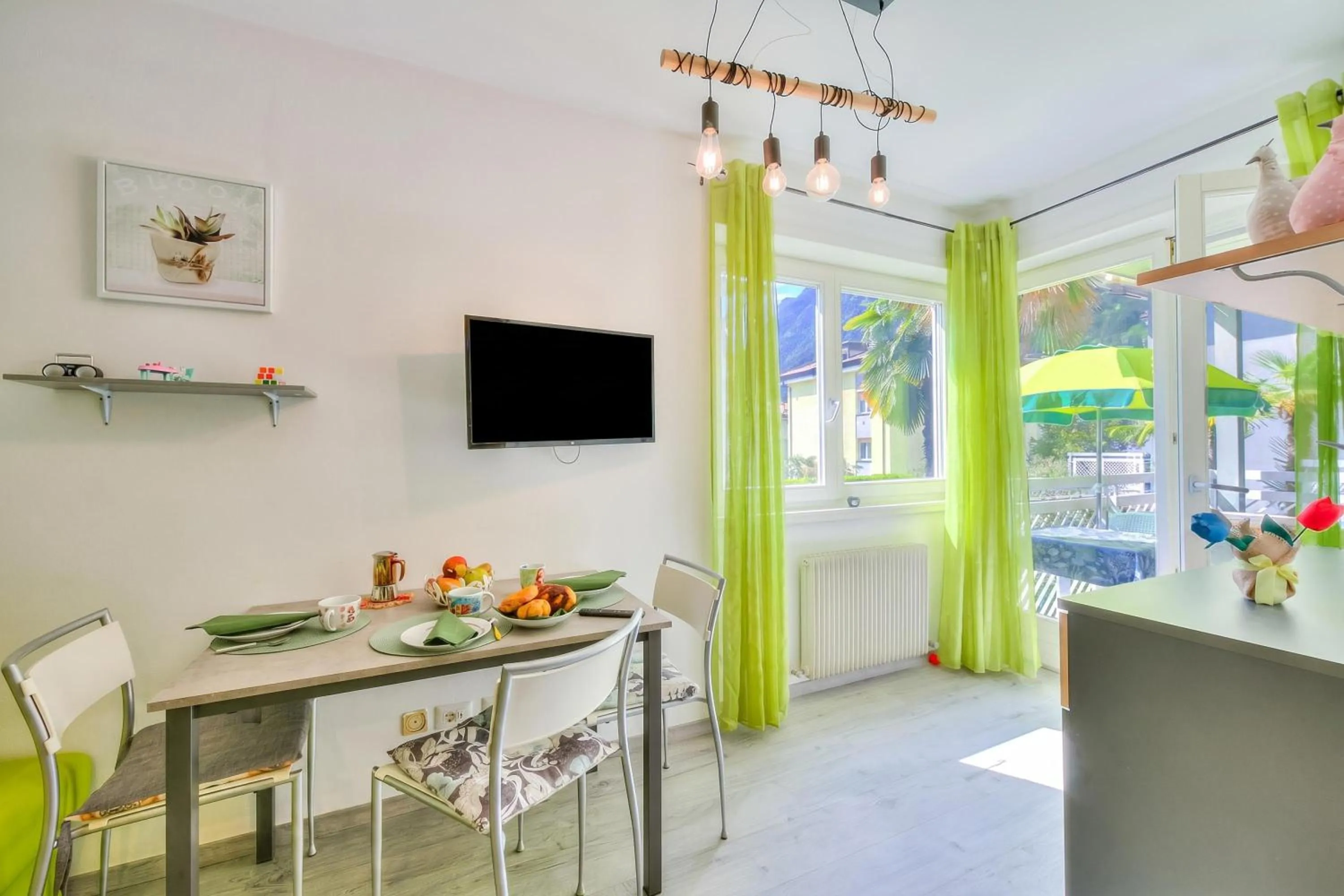 Dining area in Marina's Green Home - Happy Rentals