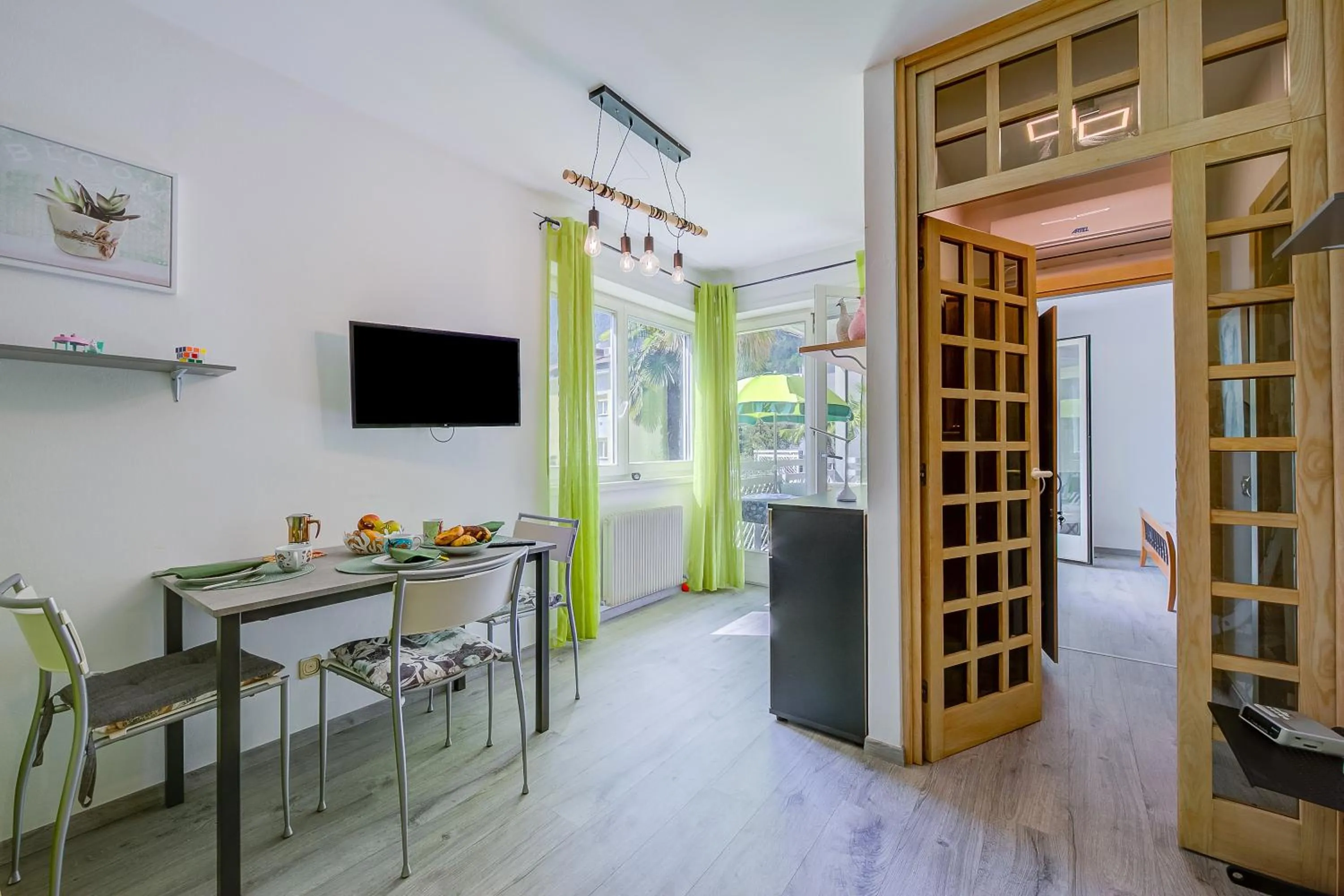 Dining area in Marina's Green Home - Happy Rentals