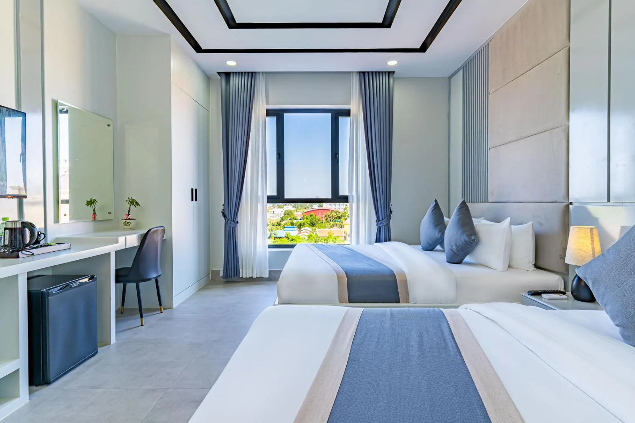 Bed in The Square Kampot Hotel