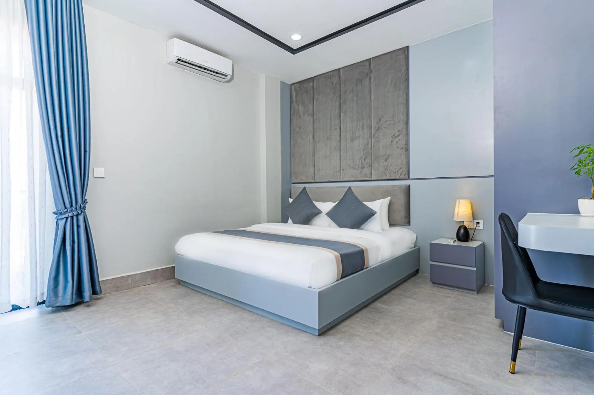 Bed in The Square Kampot Hotel