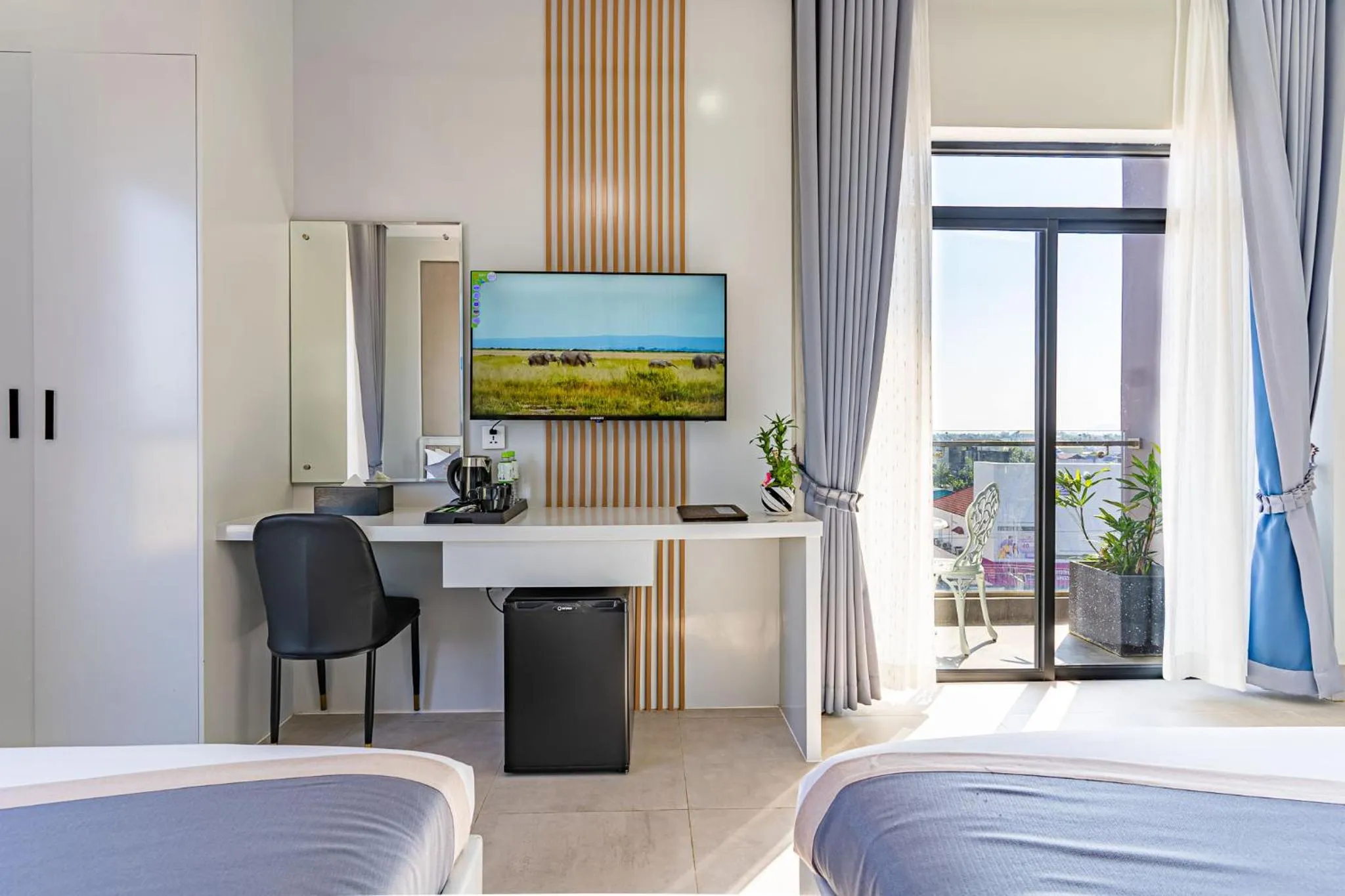 Bed in The Square Kampot Hotel