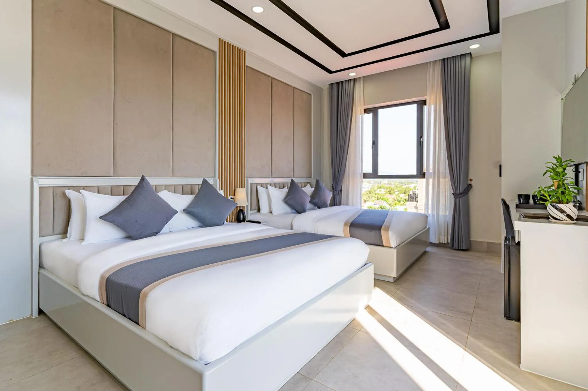 Bed in The Square Kampot Hotel