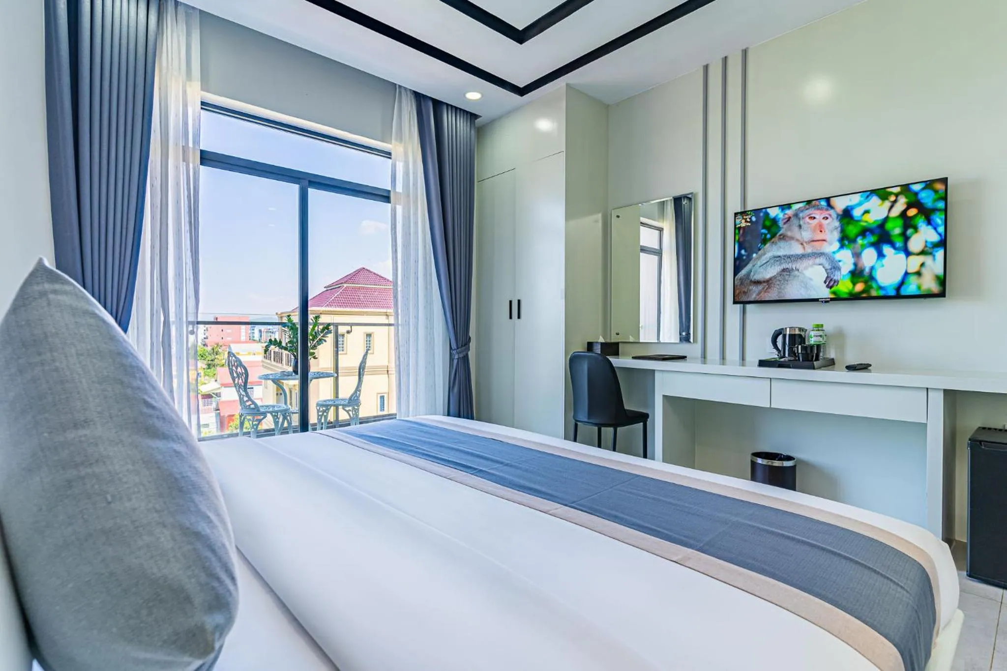 Bed in The Square Kampot Hotel