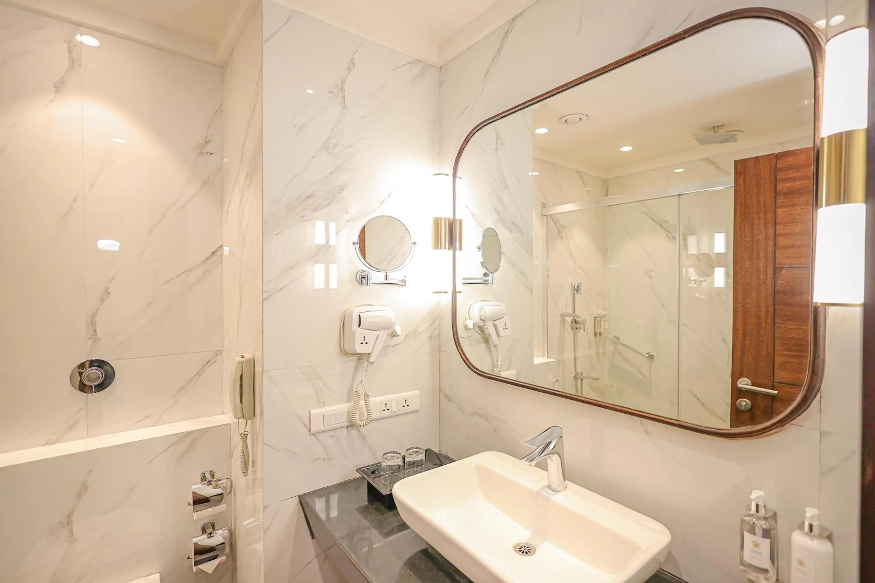 Bathroom in Regenta Dehradun by Royal Orchid Hotels Limited