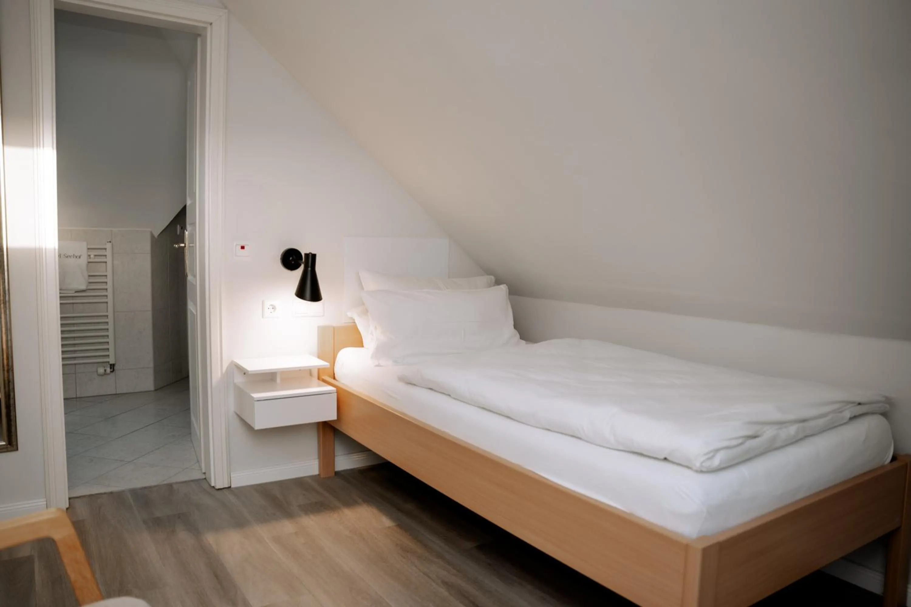 Bed in Hotel Seehof Norderney OHG