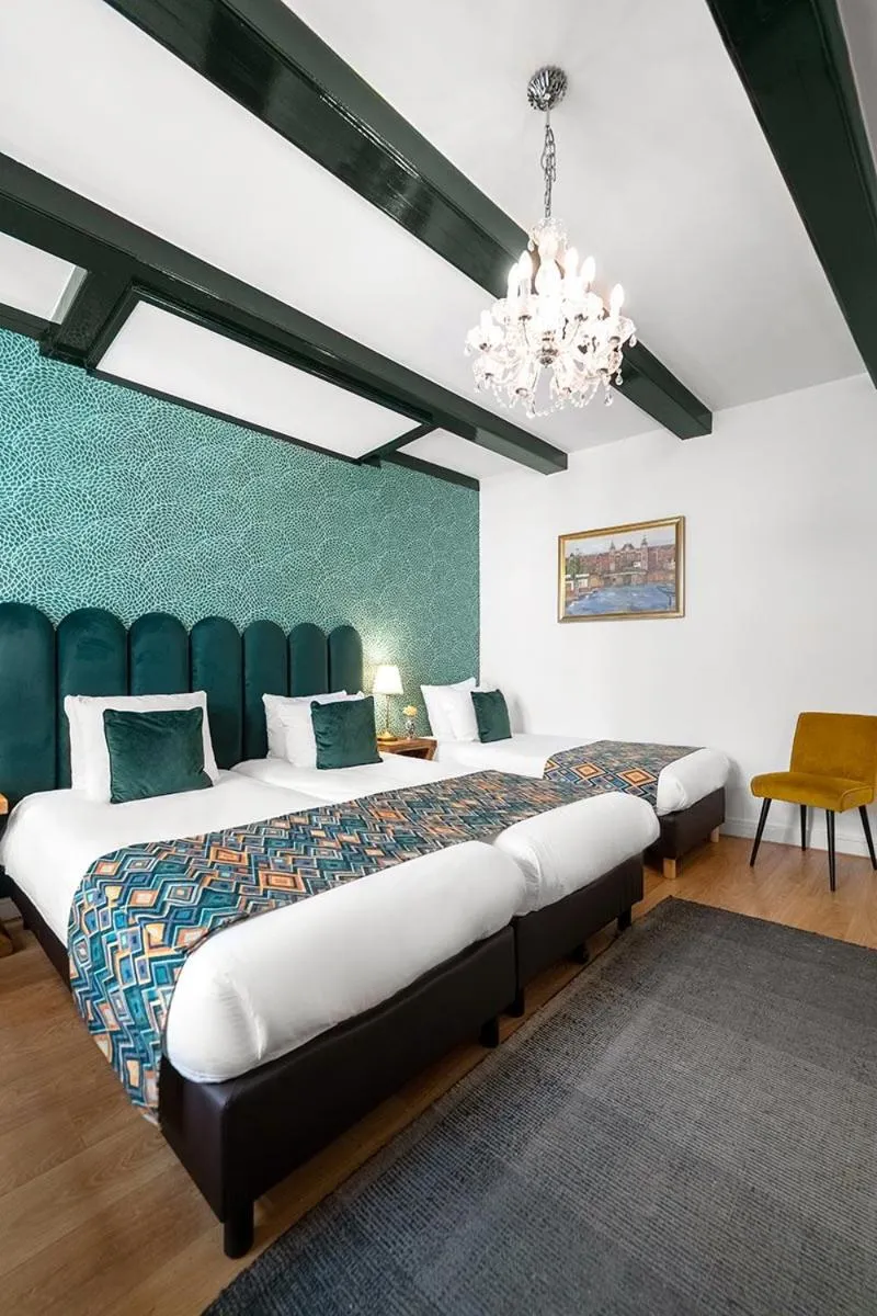 Bed in Boutique Hotel des Arts