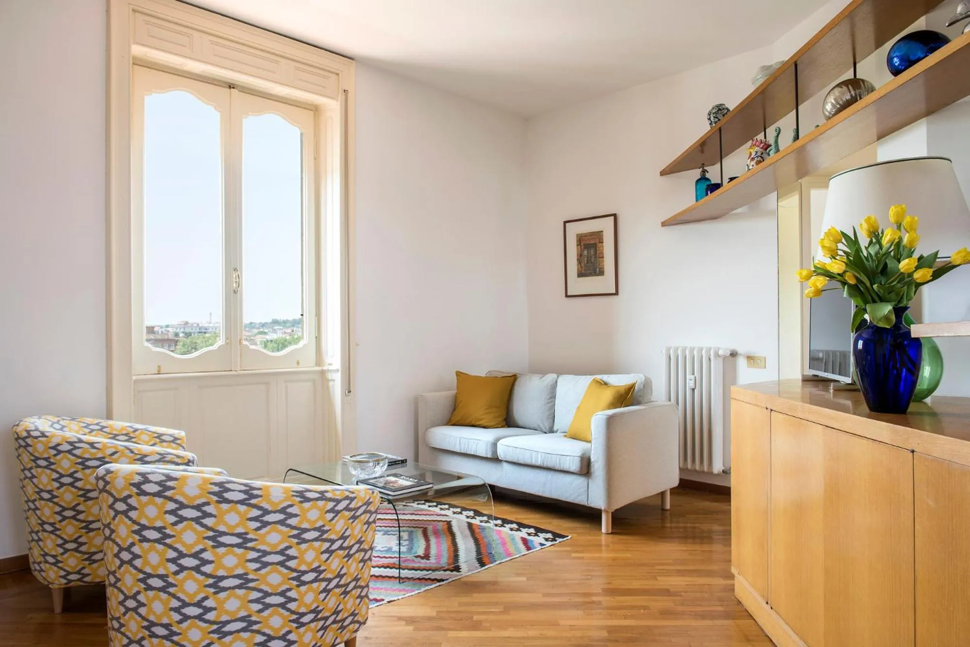 Living room in ""Bright Top Floor Apartment Vatican & Tiber View, Steps from Olympic Stadium"