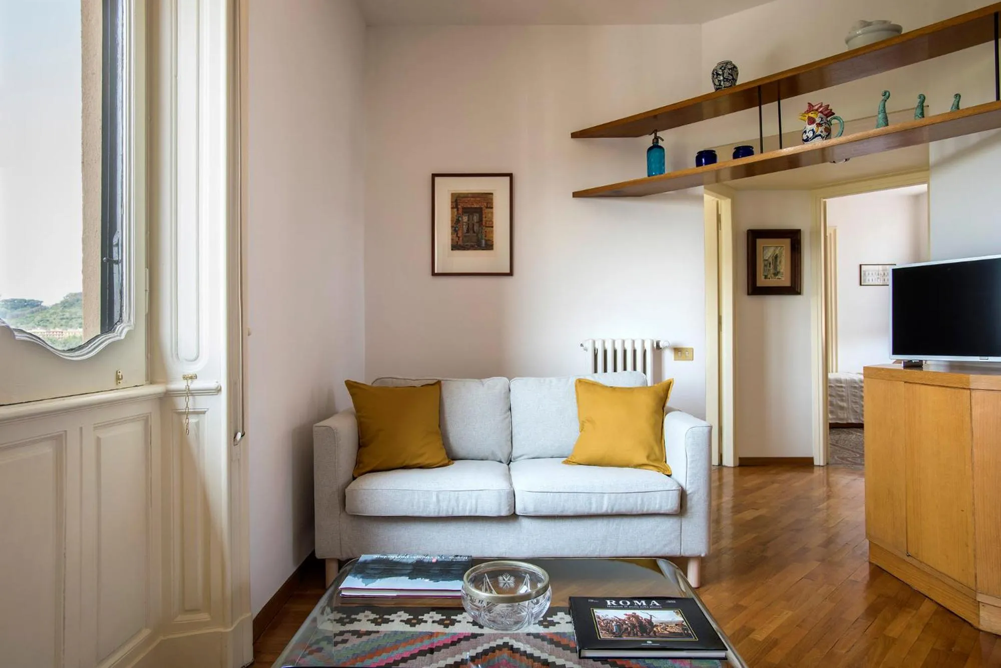 Living room in ""Bright Top Floor Apartment Vatican & Tiber View, Steps from Olympic Stadium"