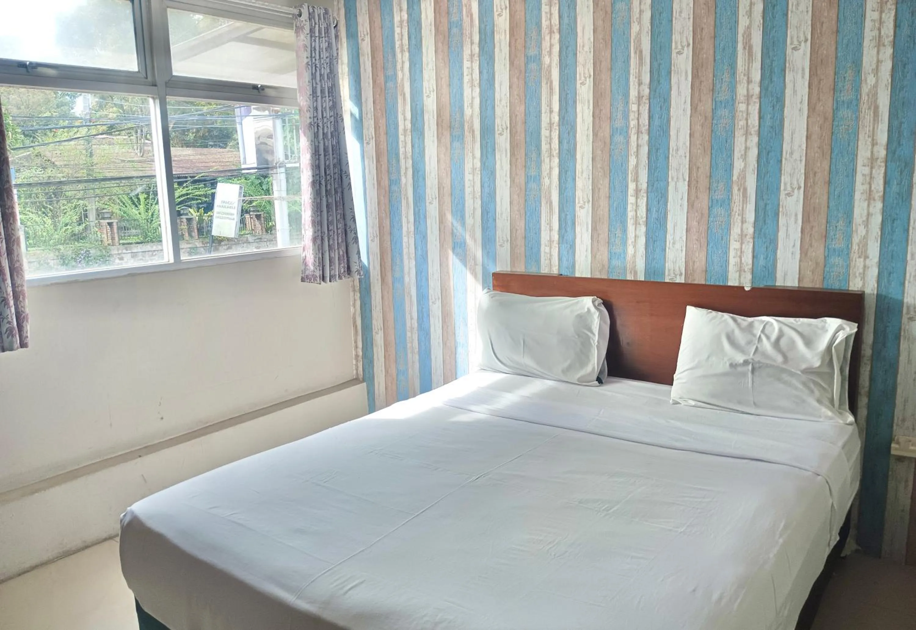 Bed in The Aurora by Makati