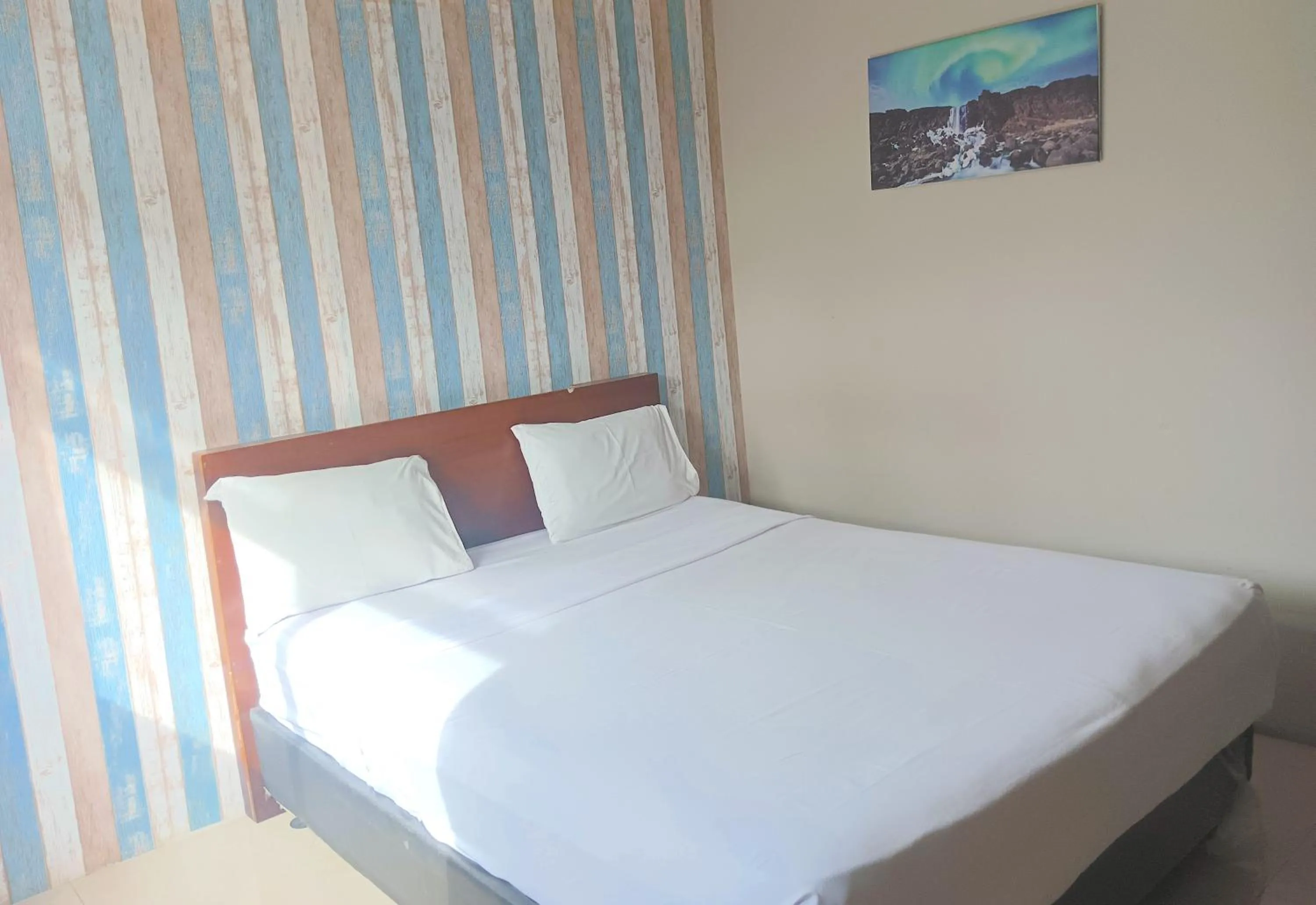 Bed in The Aurora by Makati