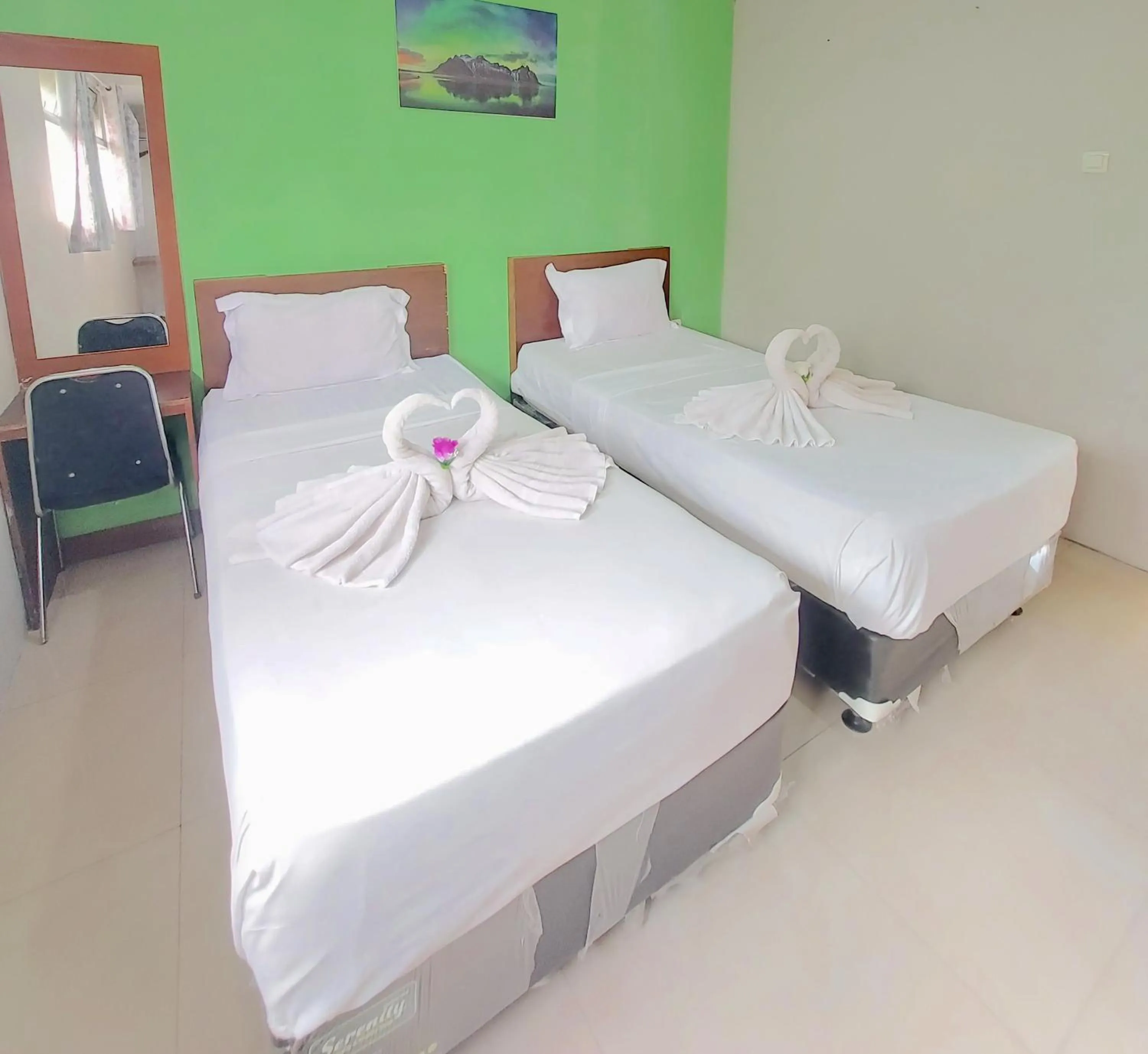 Bed in The Aurora by Makati