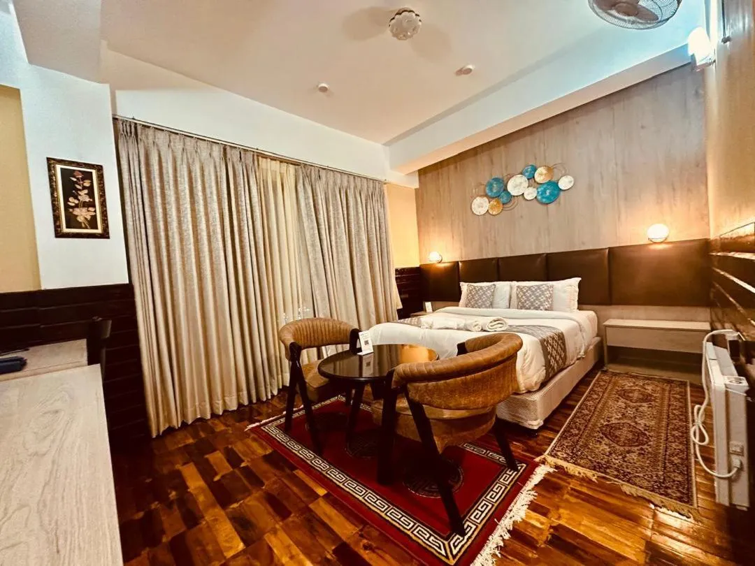 Bed in Silver Cloud Hotel