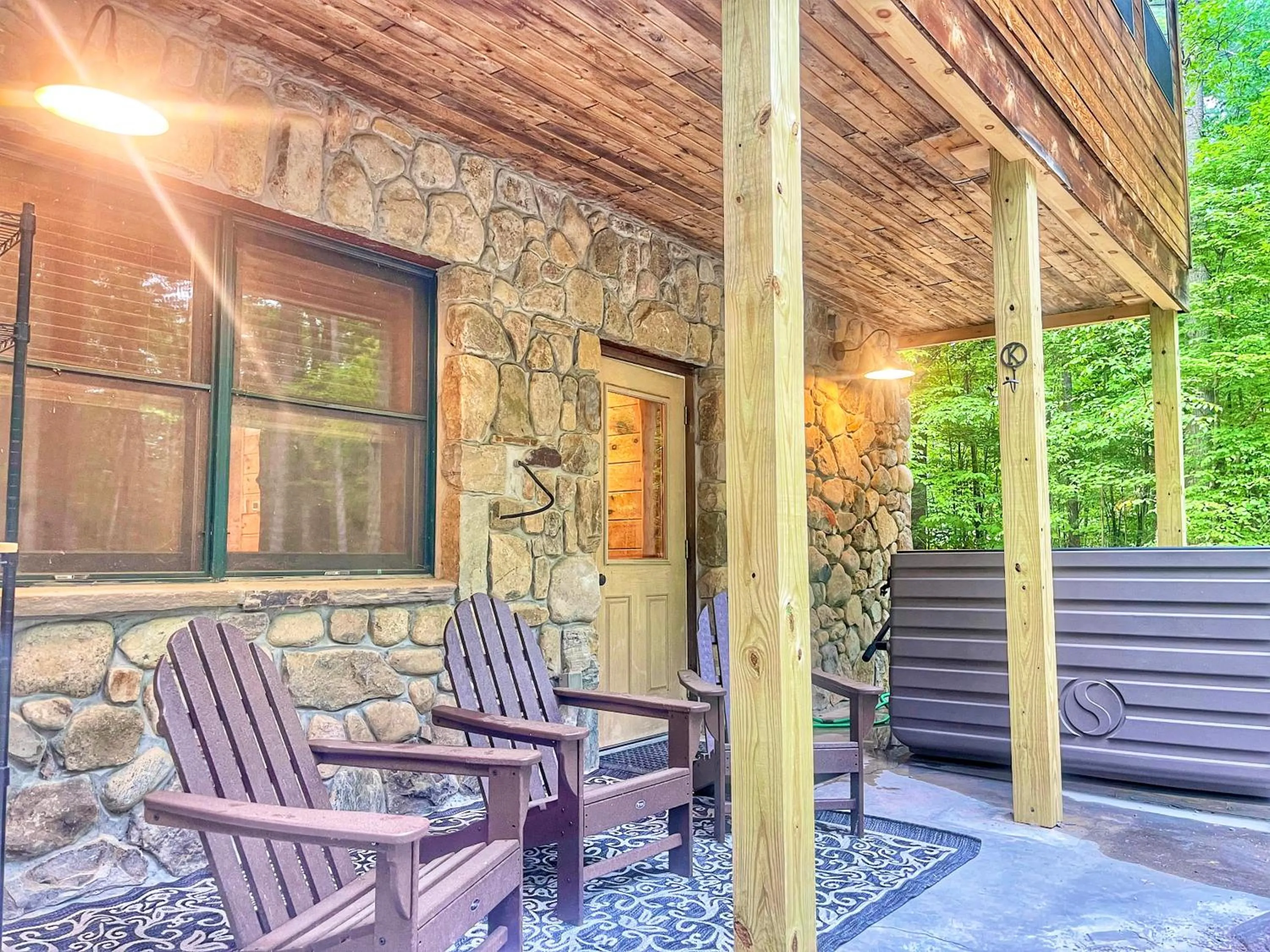 Patio in Adirondack Mountain Cabin with Hot Tub, Near Whiteface, Lake Placid, Fire Pit, Game Rm
