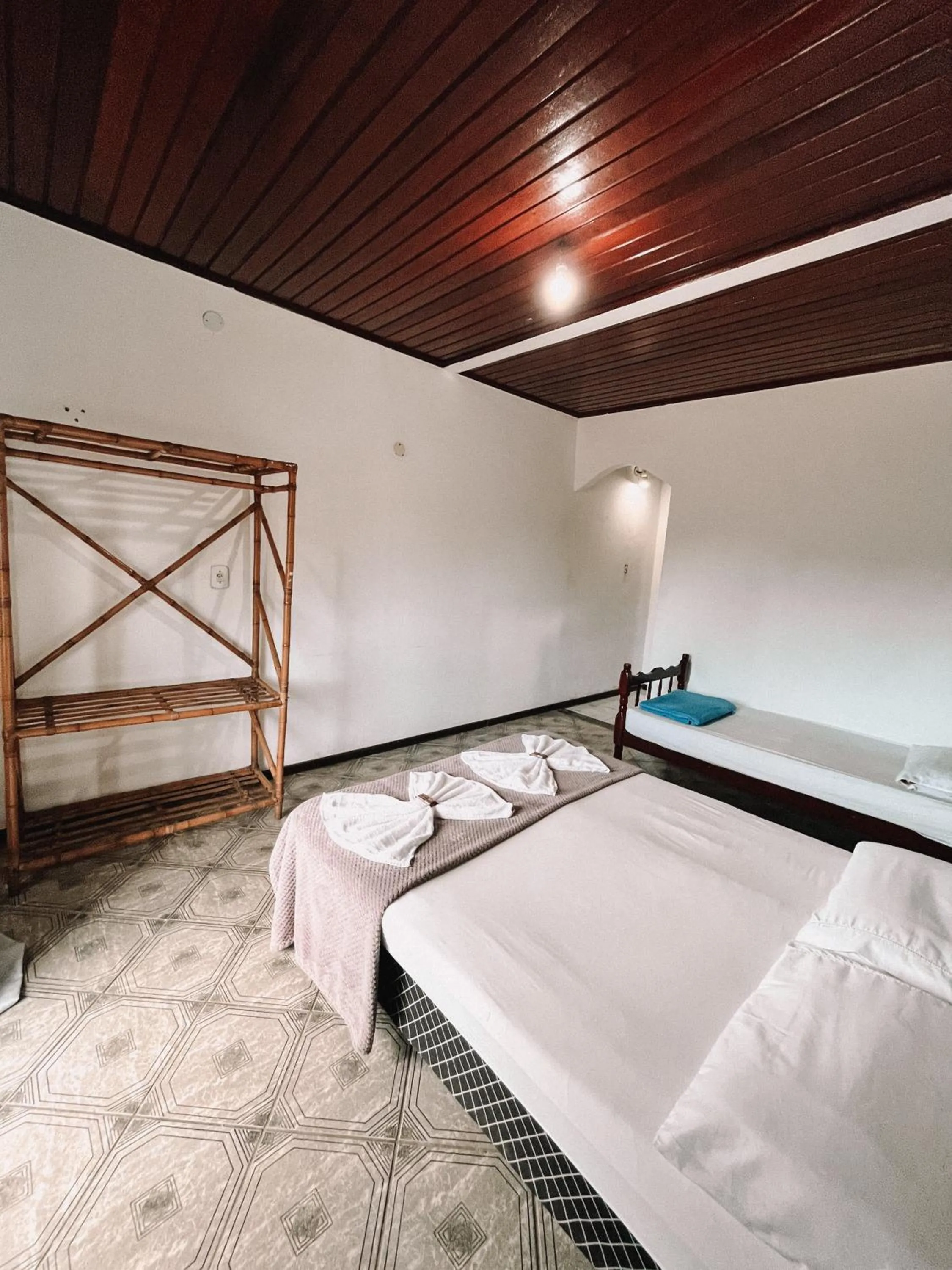 Bed in Pousada Porto di Mare
