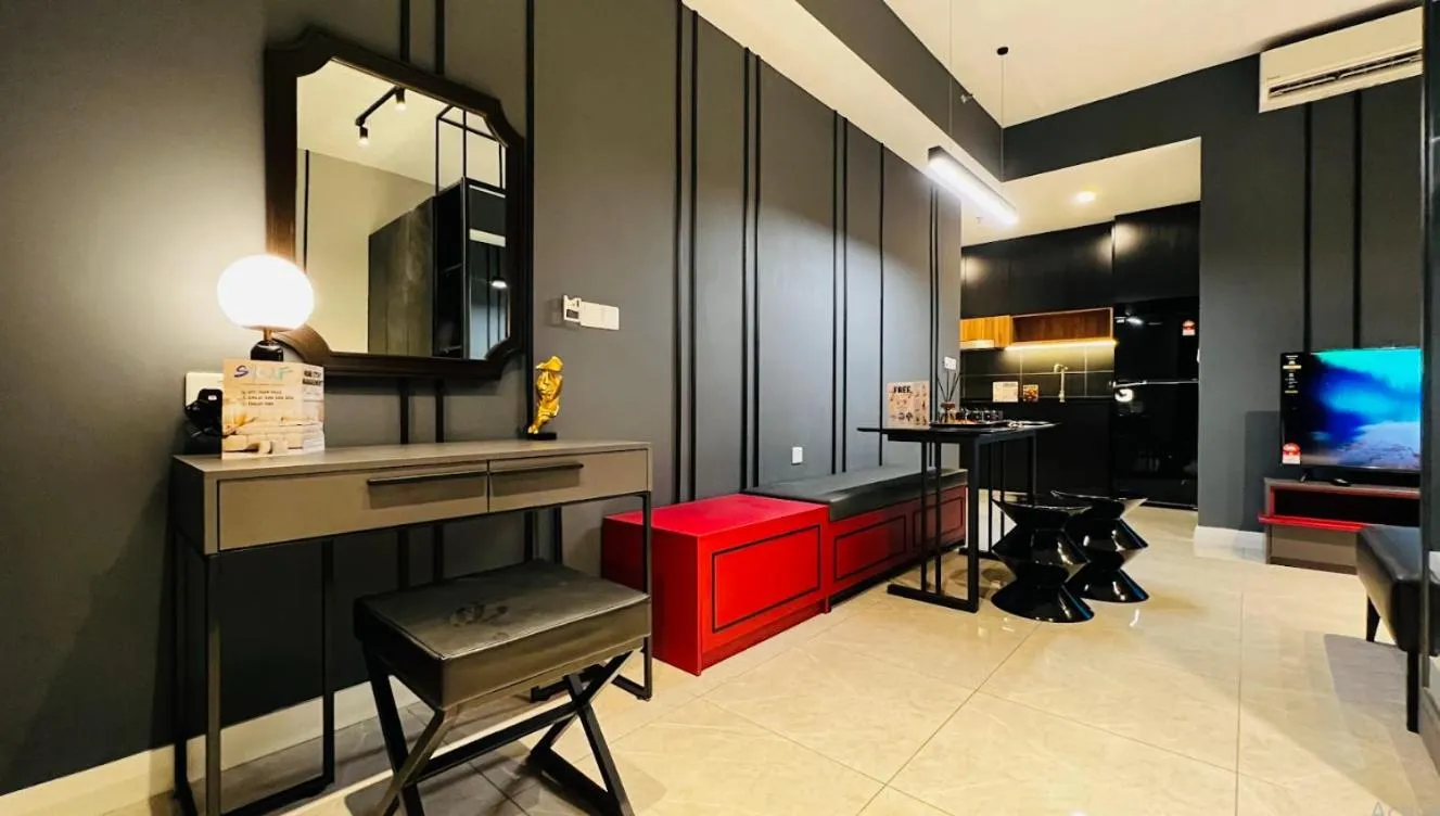 Communal lounge/ TV room in The Axon Bukit Bintang by SMOVF BNB