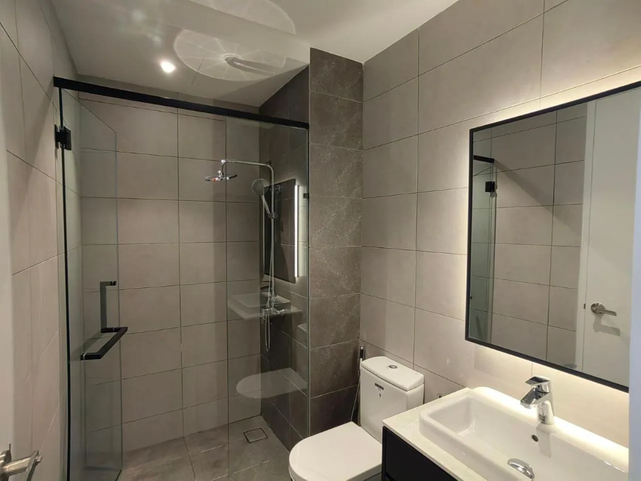 Bathroom in The Axon Bukit Bintang by SMOVF BNB