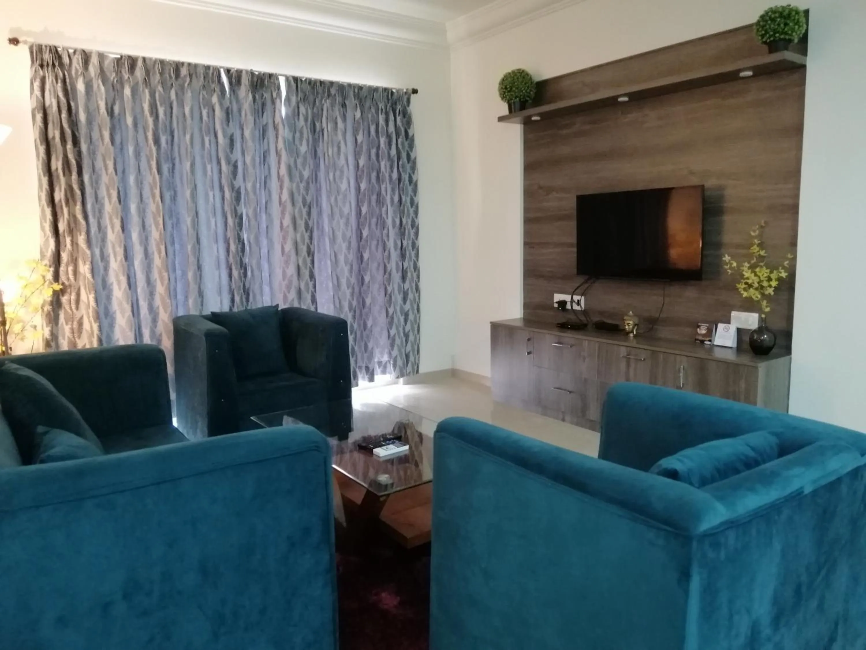 Living room in Apartel by Aarin - Oragadam