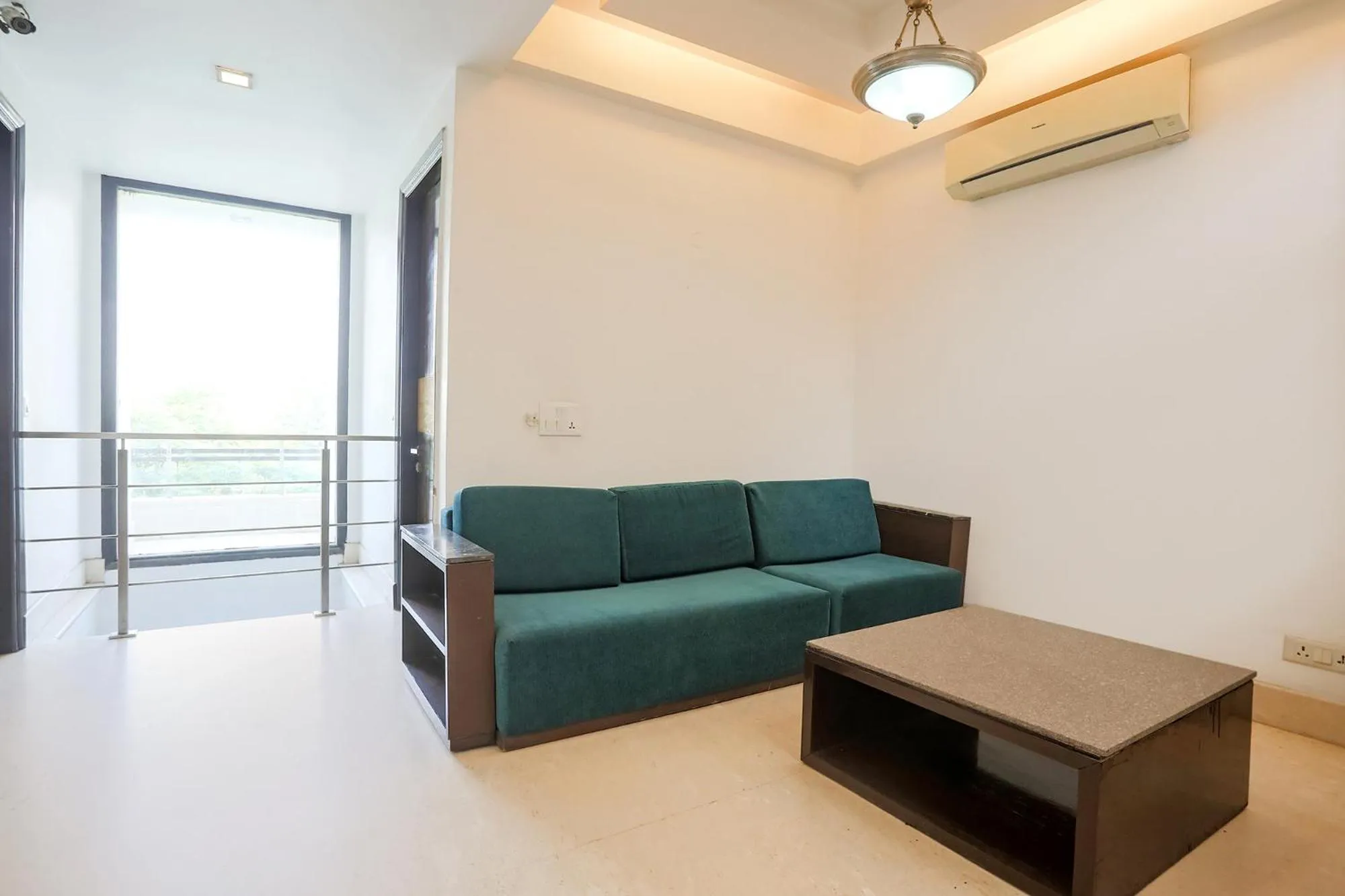 Seating area in FabHotel Rivlet Residency