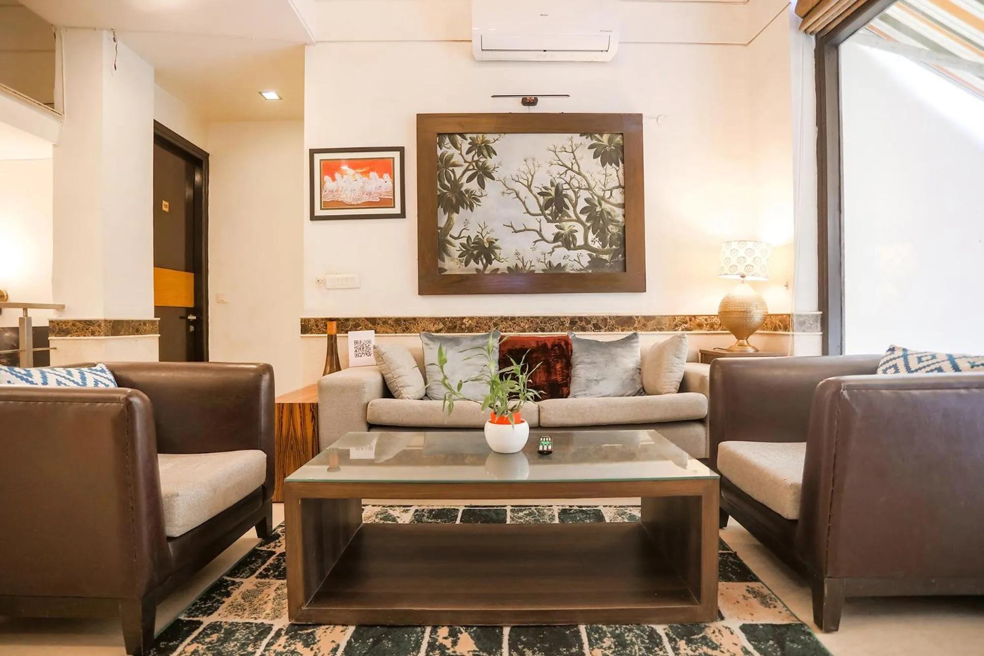 Seating area in FabHotel Rivlet Residency