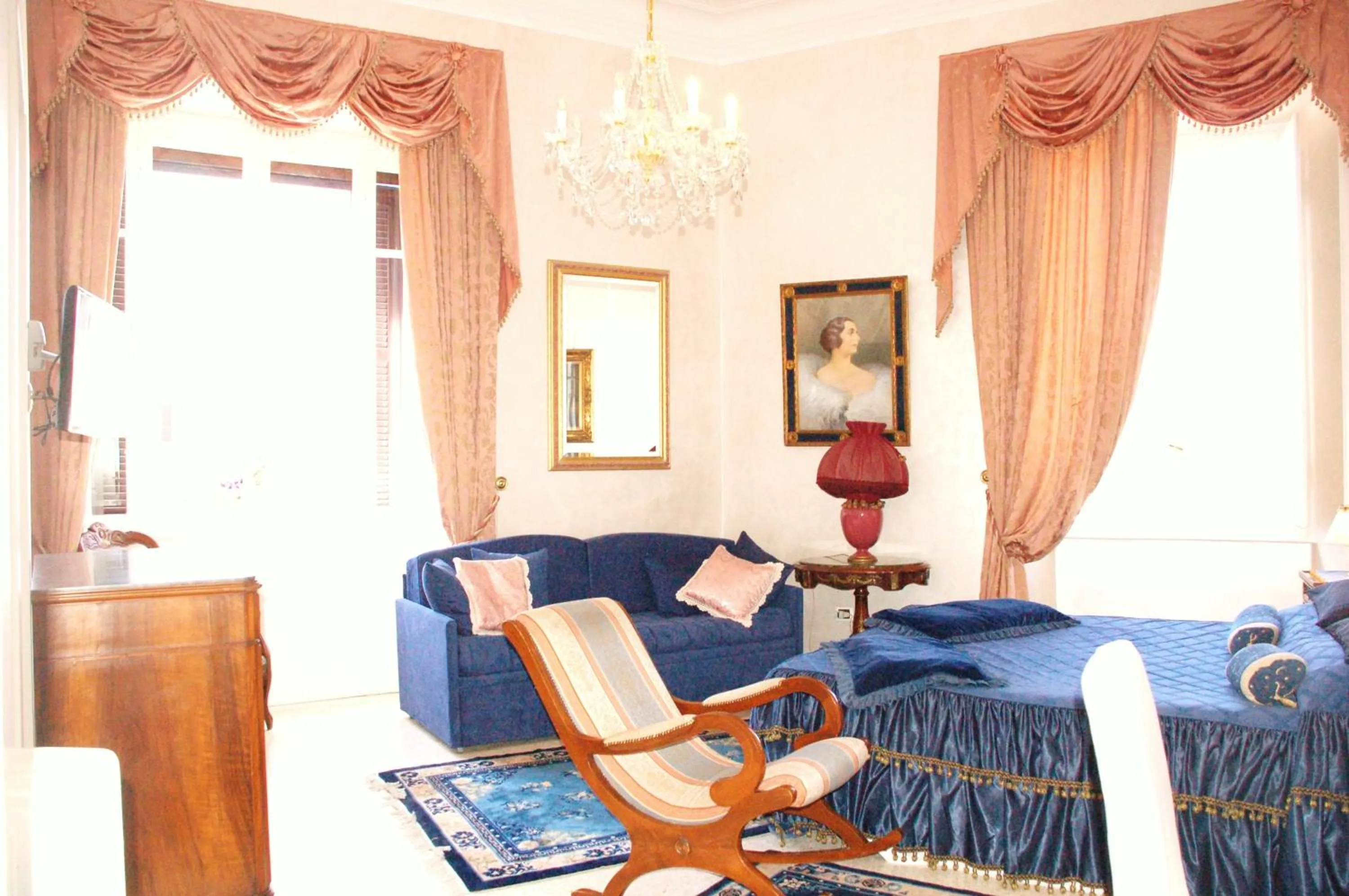 Bed in Charme Holidays Colosseum