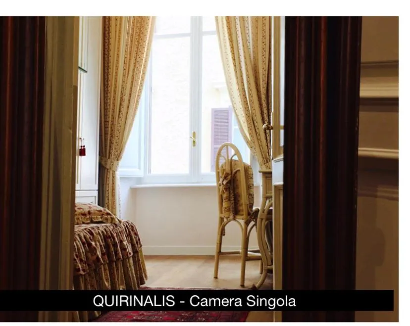 Bed in Charme Holidays Colosseum