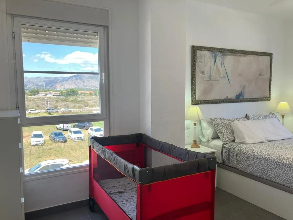 Bed in Seaside Apartment Retreat
