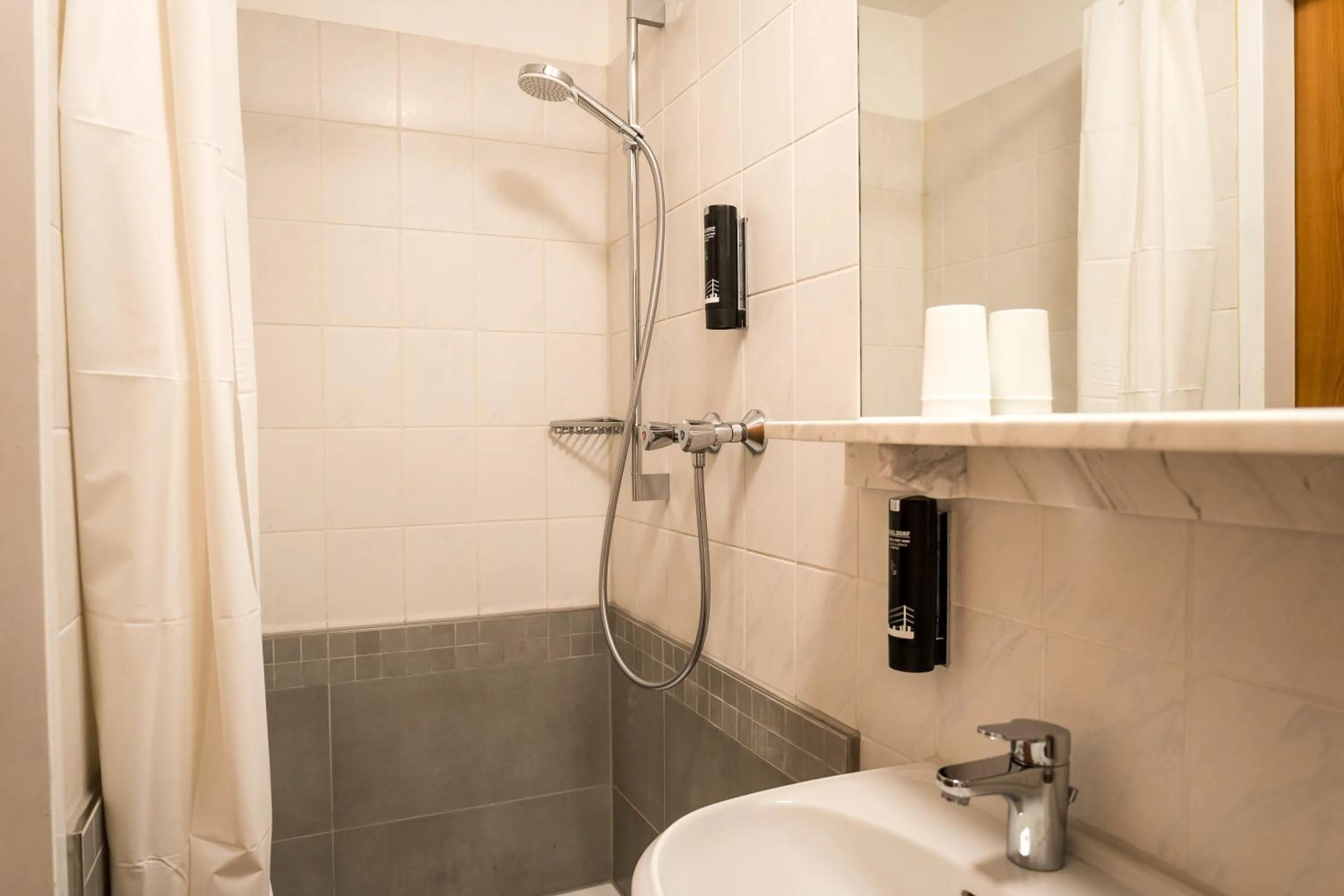 Shower in Antares Apartments