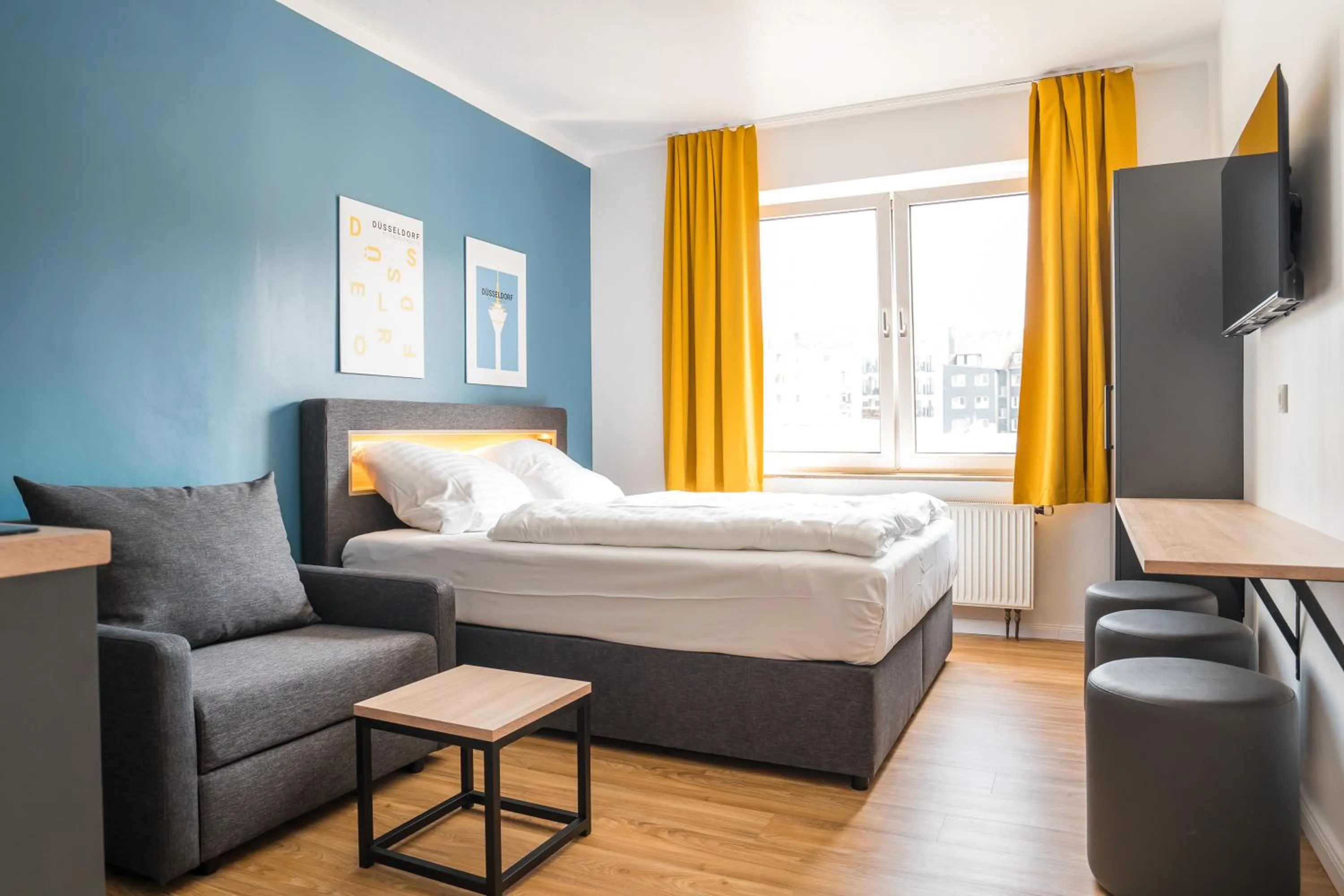 TV and multimedia, Bed in Antares Apartments