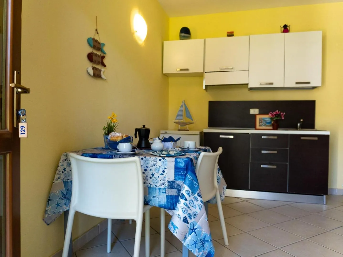 Kitchen or kitchenette in Pineta Azzurra