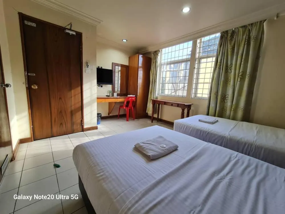 Bed in Lady Anne Hotel Sandkan