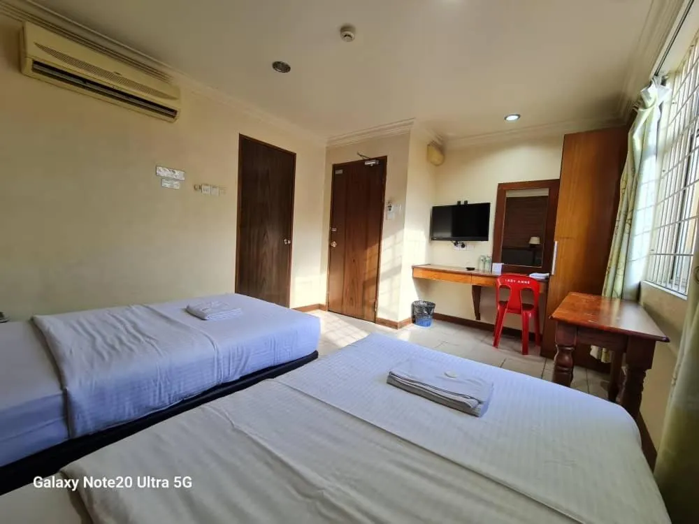 Bed in Lady Anne Hotel Sandkan