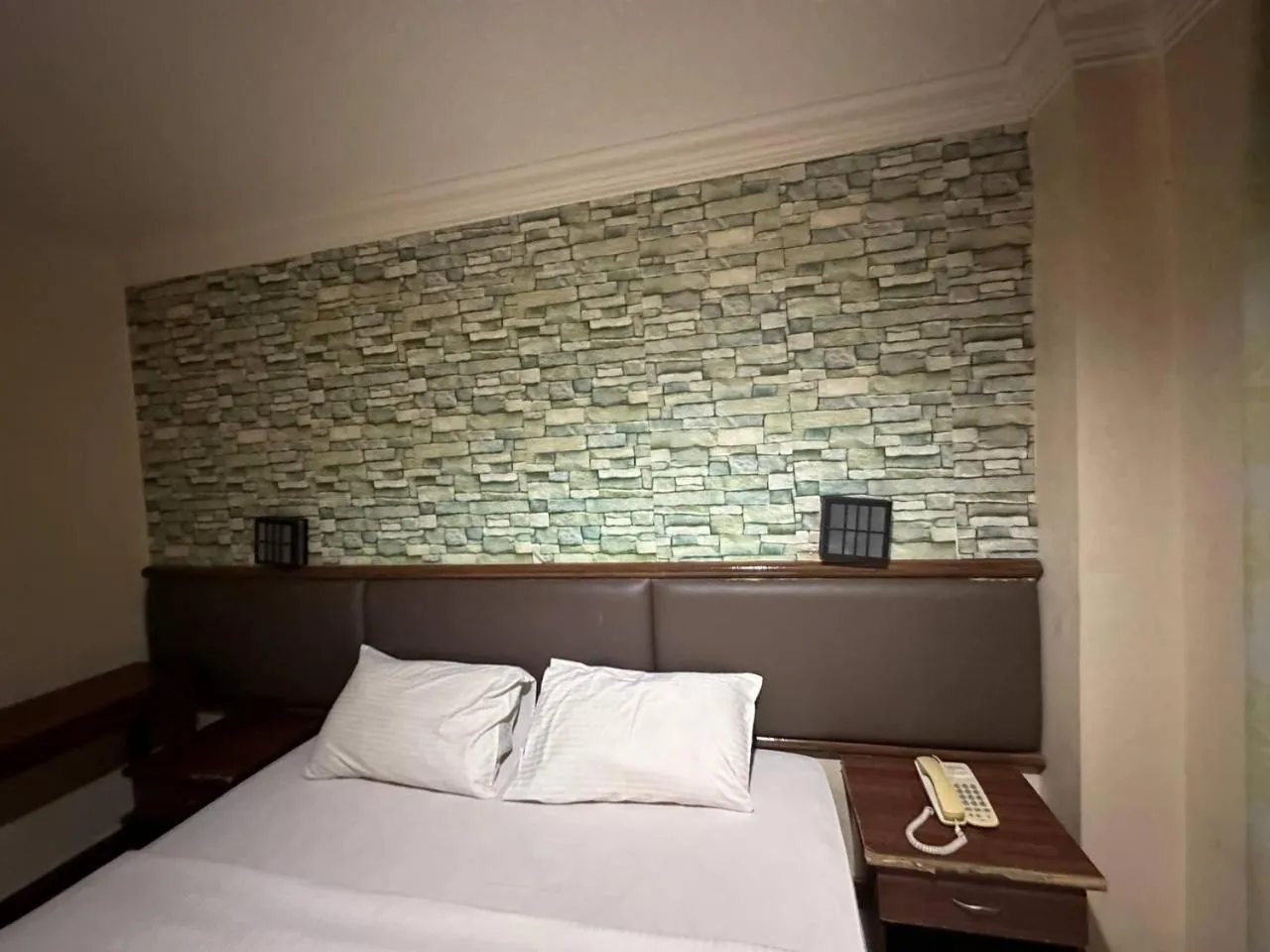 Bed in Lady Anne Hotel Sandkan