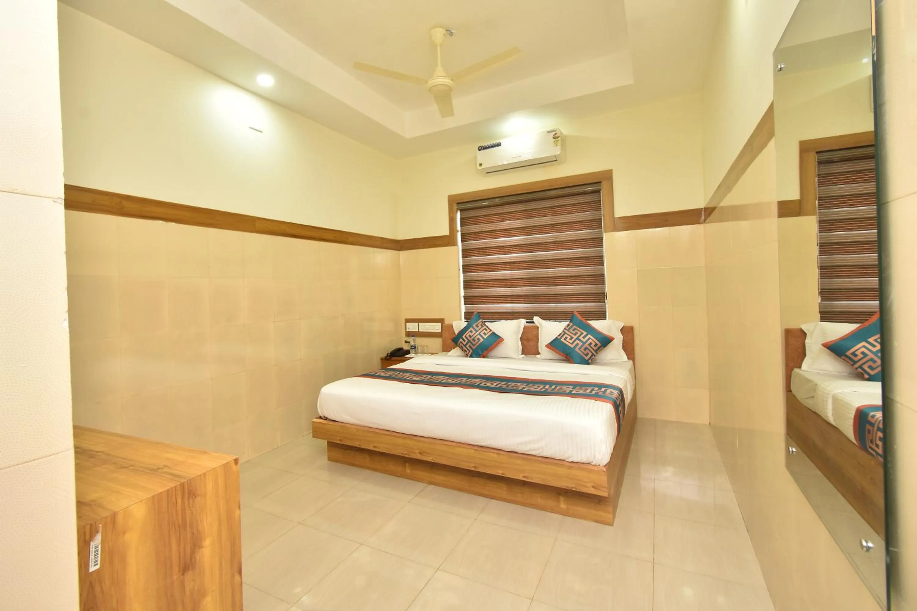 Photo of the whole room, Bed in HOTEL KANNUR CAPITAL CALTEX