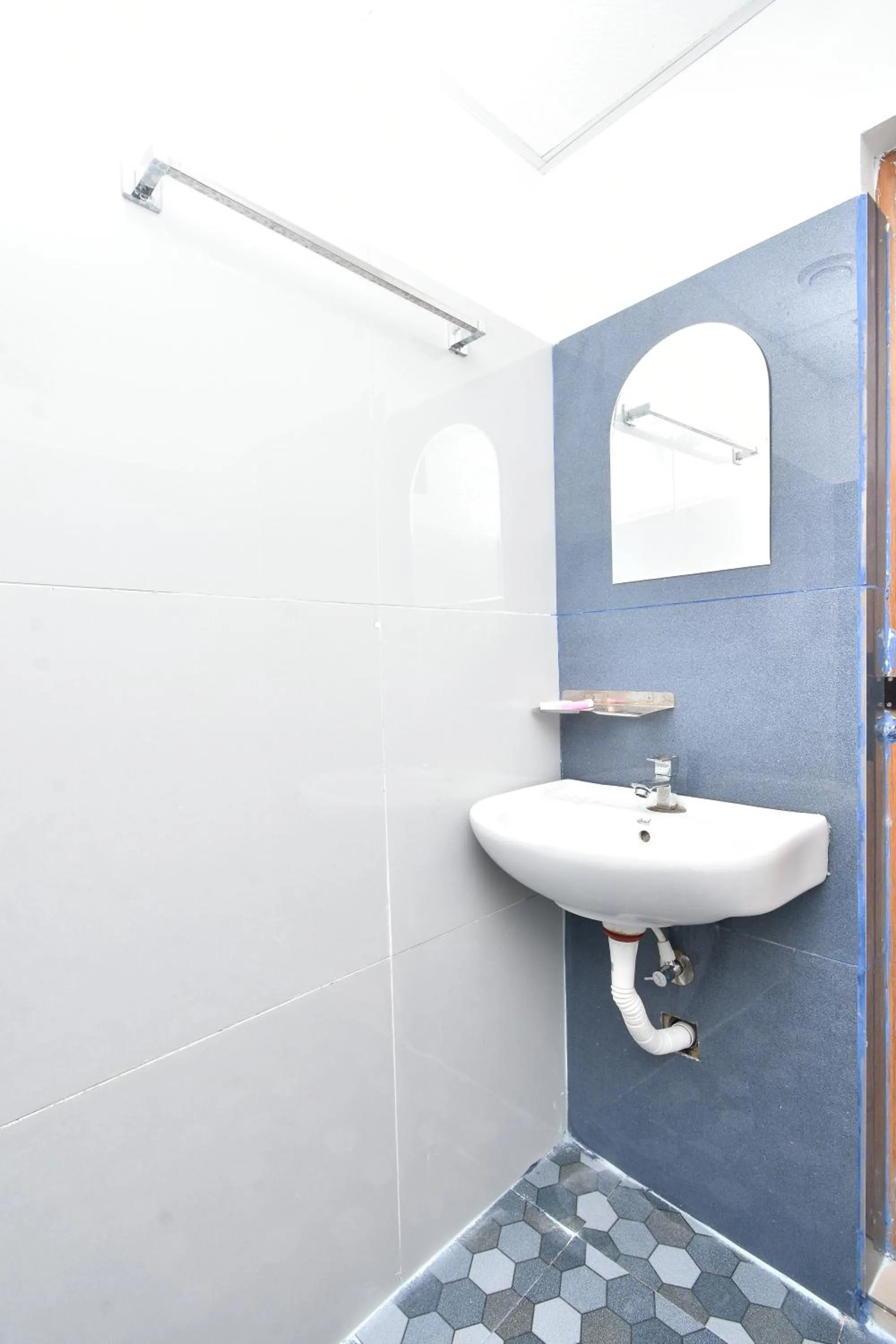 Toilet in HOTEL KANNUR CAPITAL CALTEX