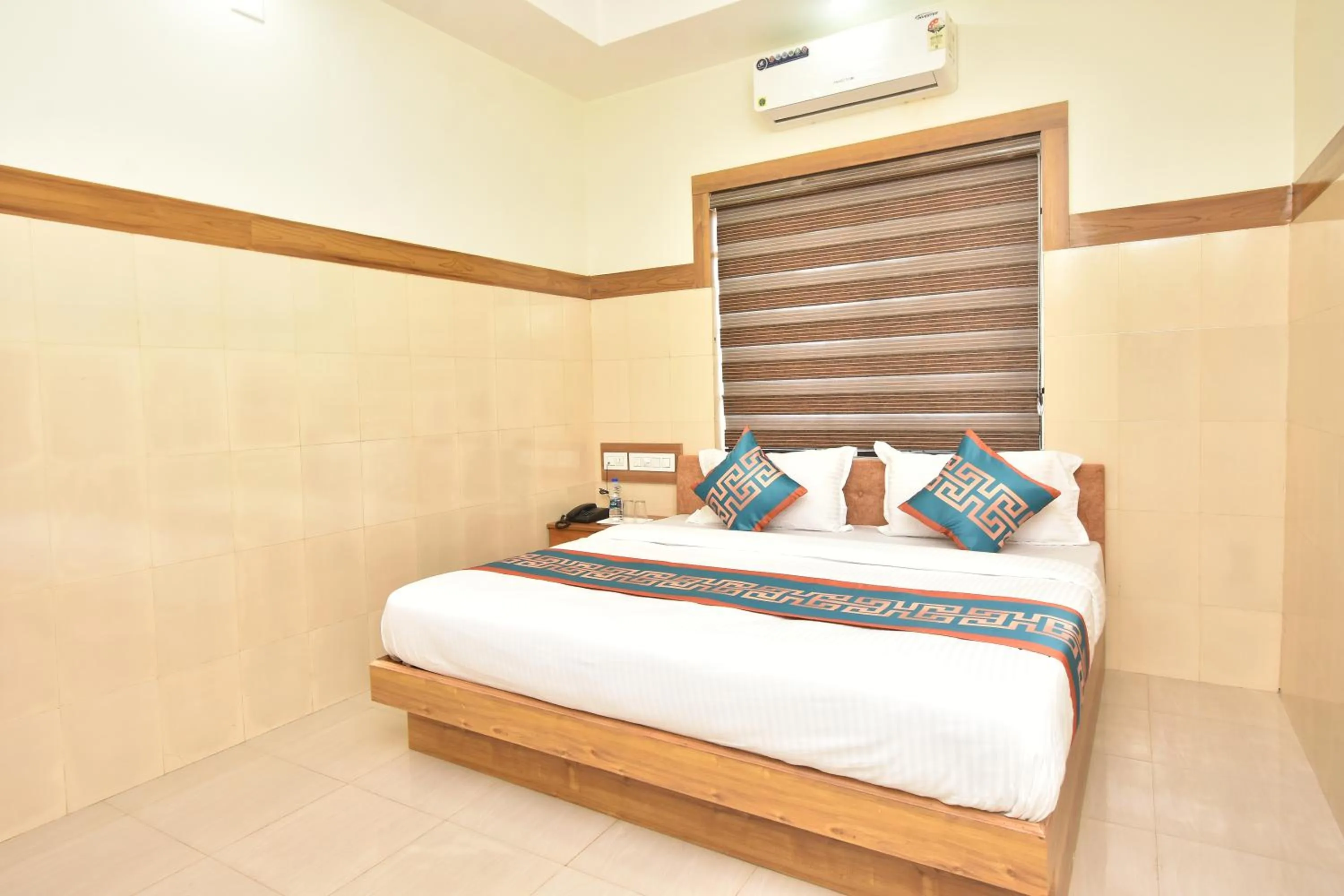 Photo of the whole room, Bed in HOTEL KANNUR CAPITAL CALTEX