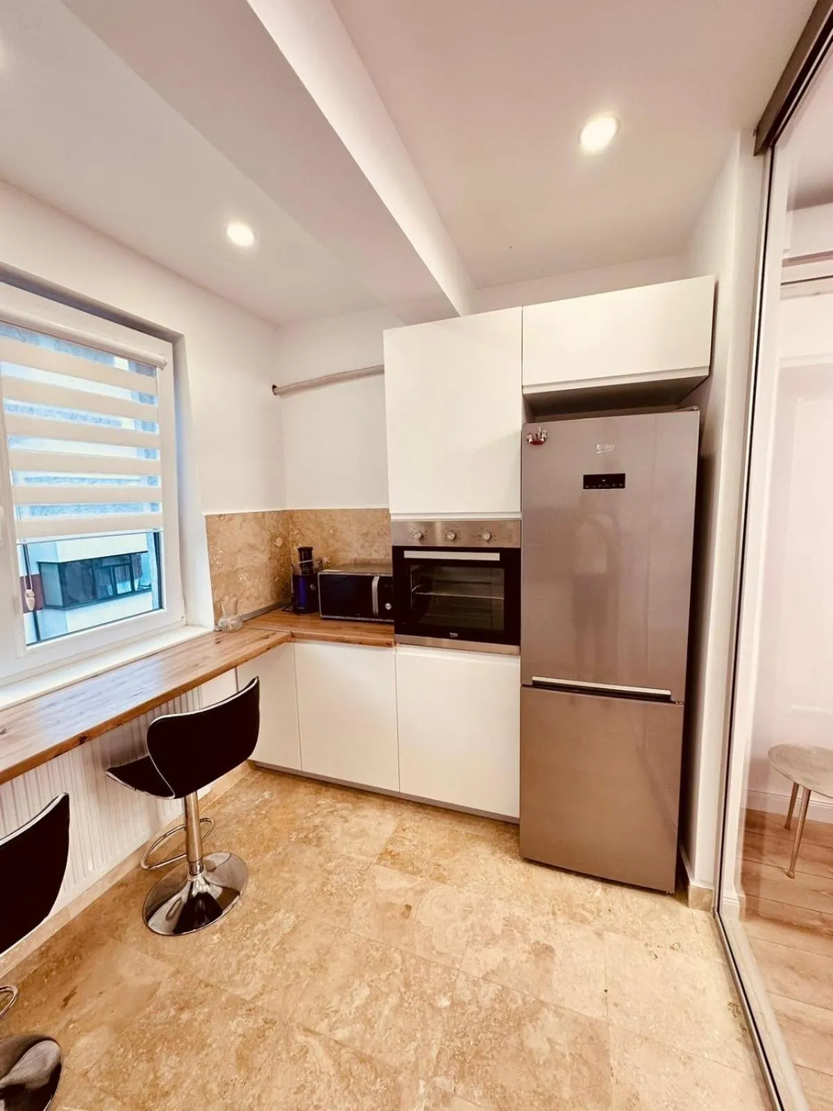 Kitchen or kitchenette in Avangarde Apartment