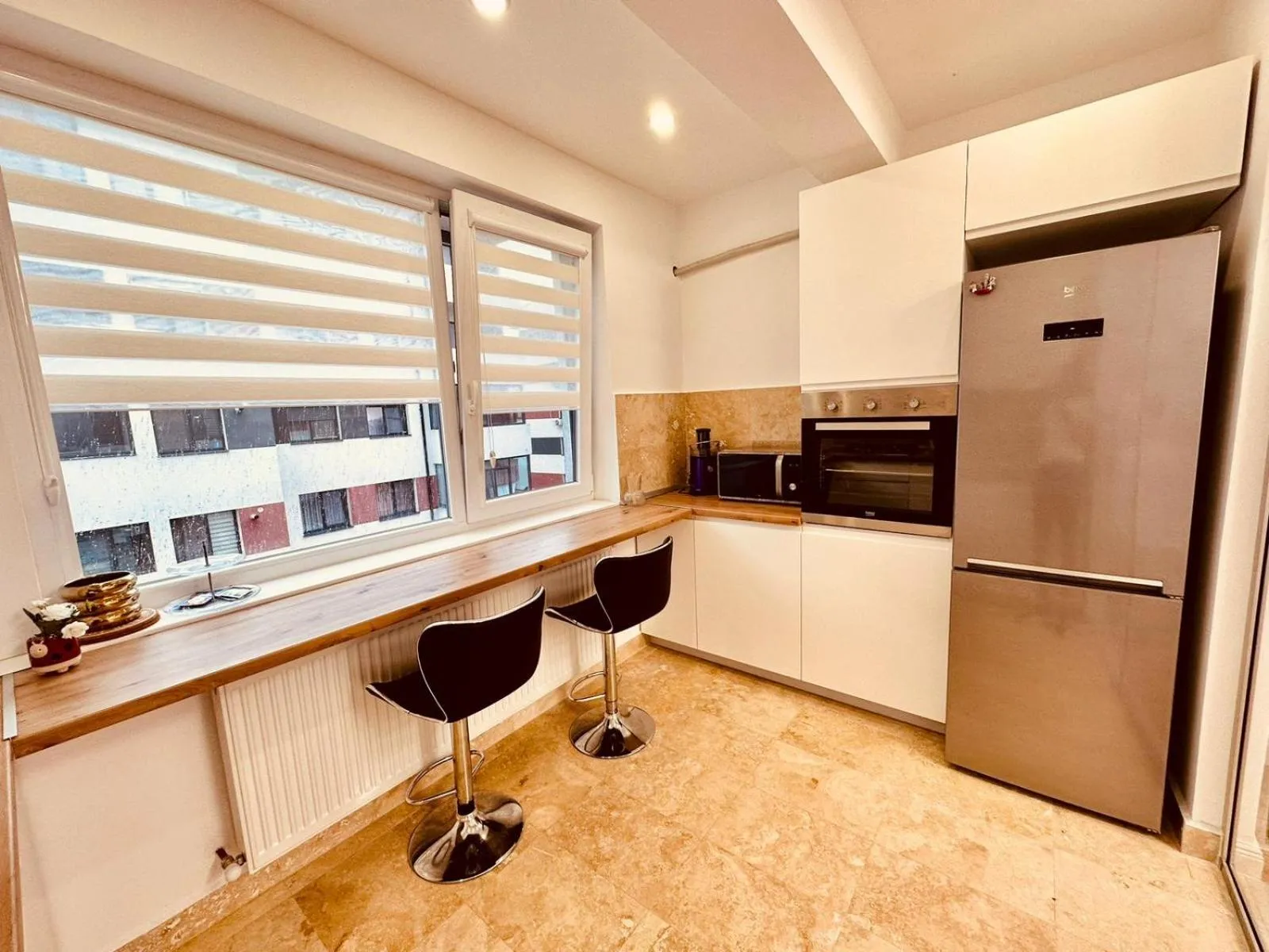 Kitchen or kitchenette in Avangarde Apartment