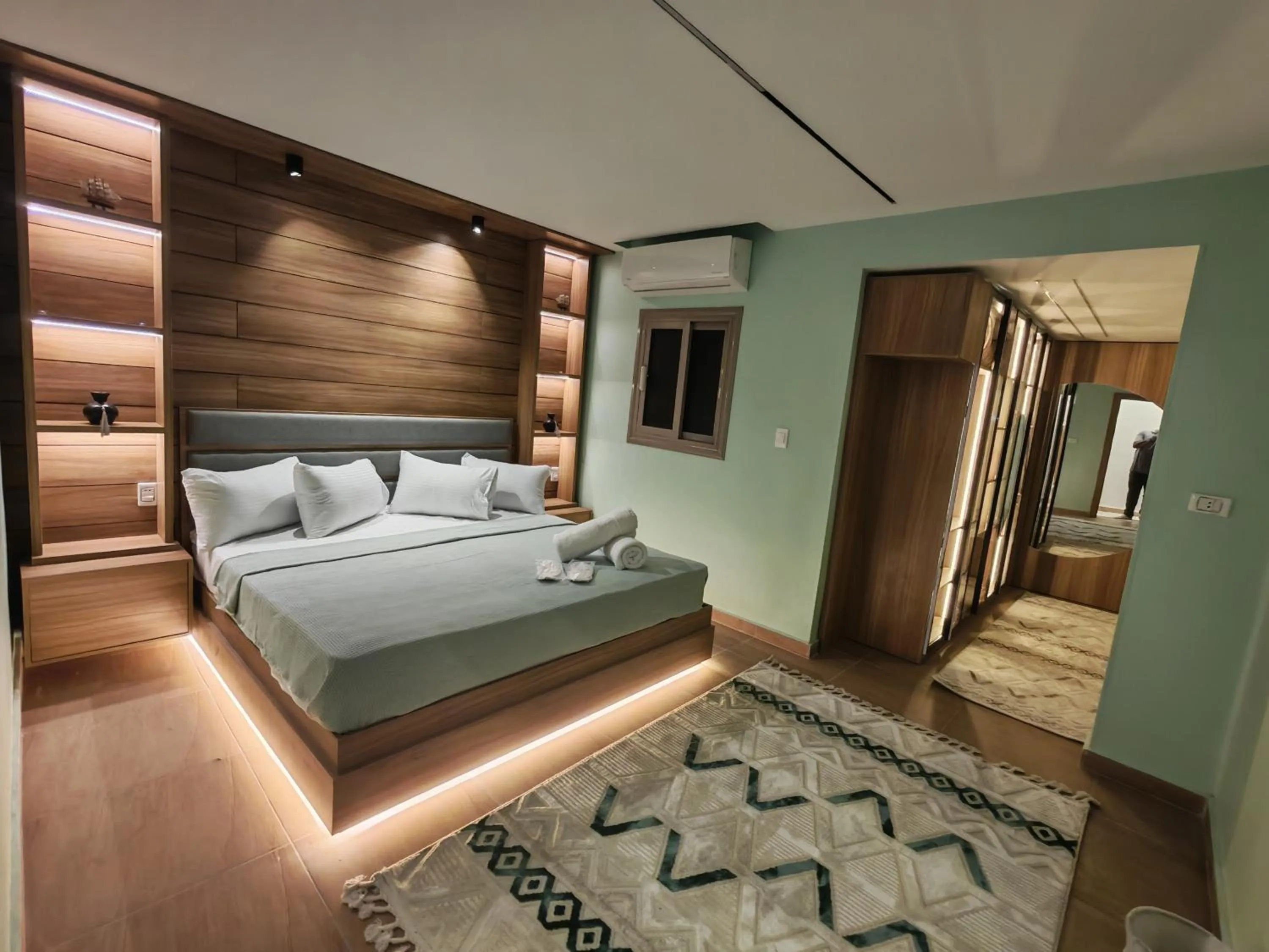 Photo of the whole room, Bed in downtown Family Suites