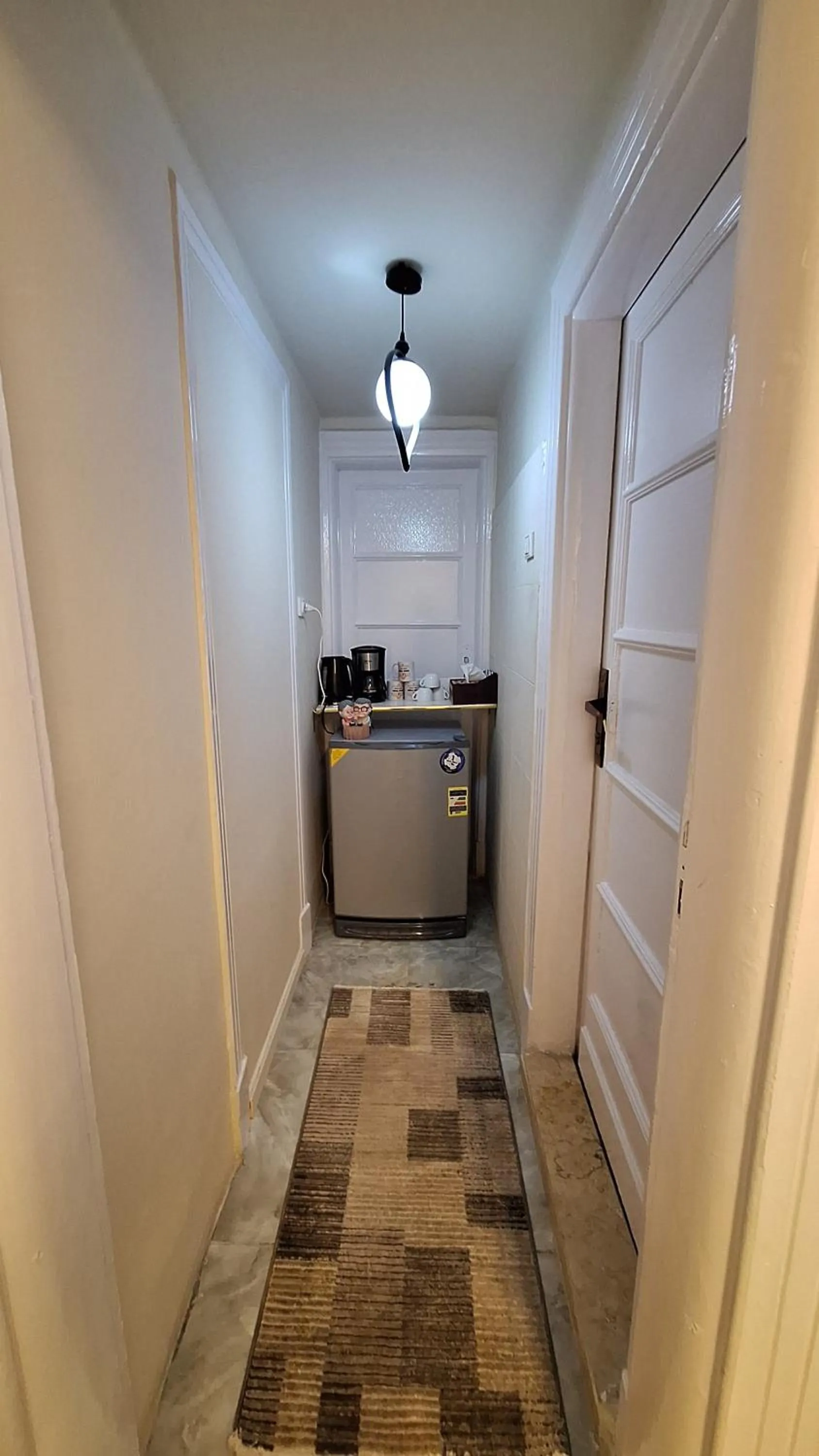 Kitchen or kitchenette in downtown Family Suites