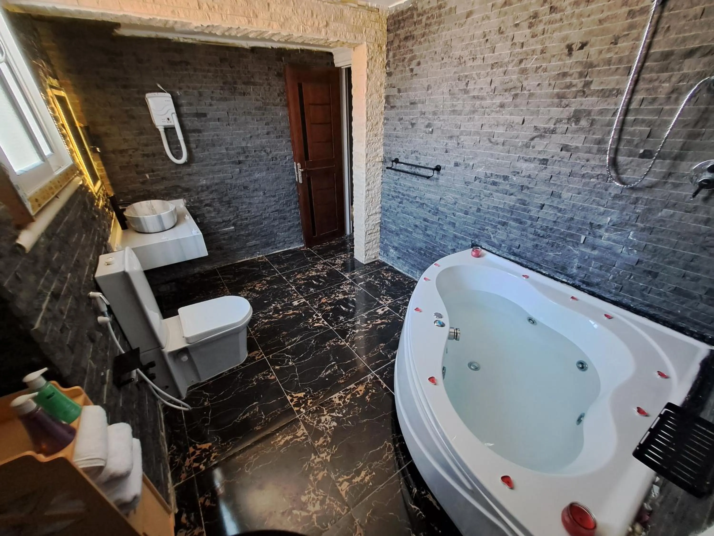 Bathroom in downtown Family Suites